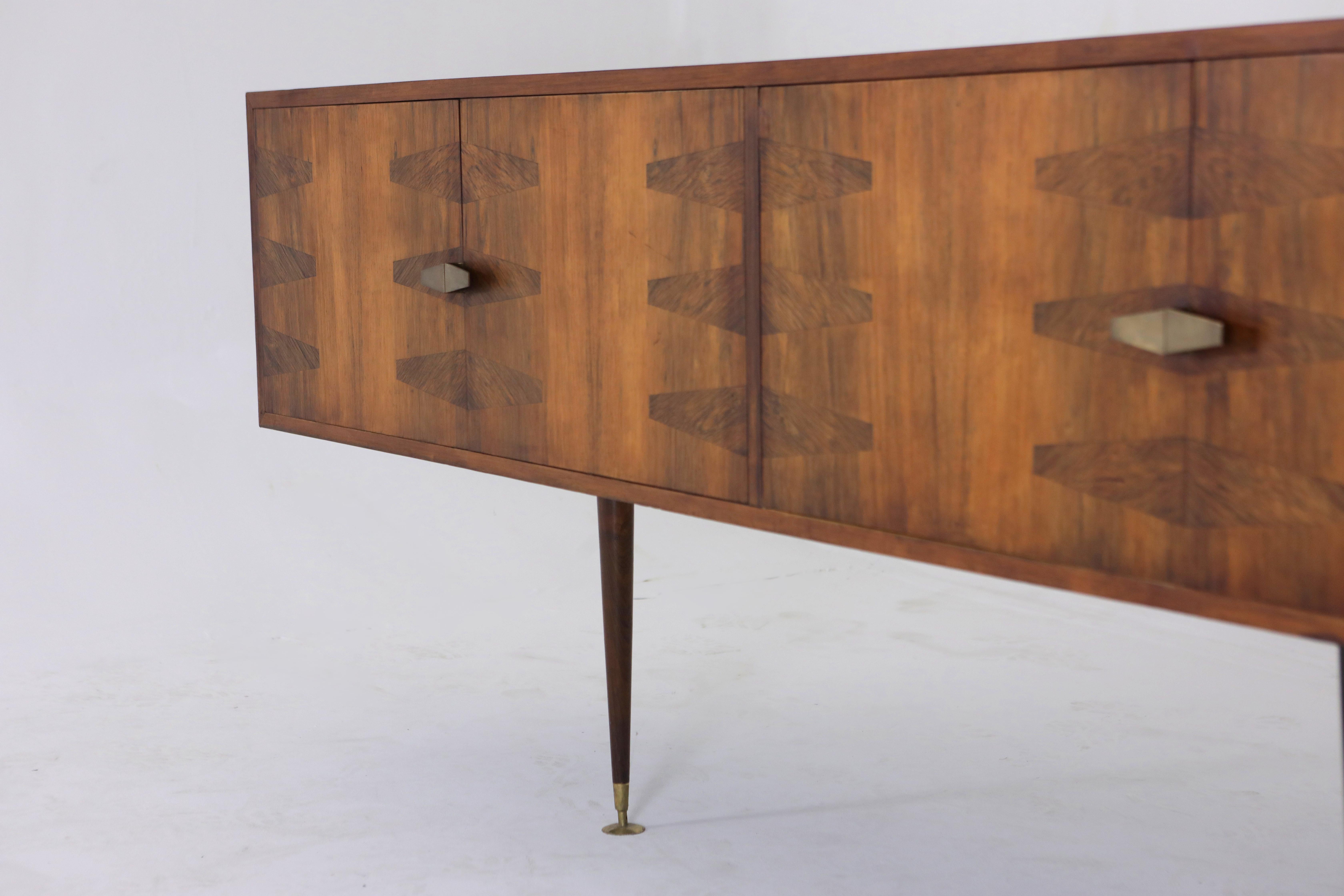 Very rare Mid-Century Modern wall-mounted buffet by Brazilian Designer Giuseppe Scapinelli, Brazil, 1950s

This piece was designed by the acclaimed Italian-born designer Giuseppe Scapinelli. Structured in solid wood, this piece features two