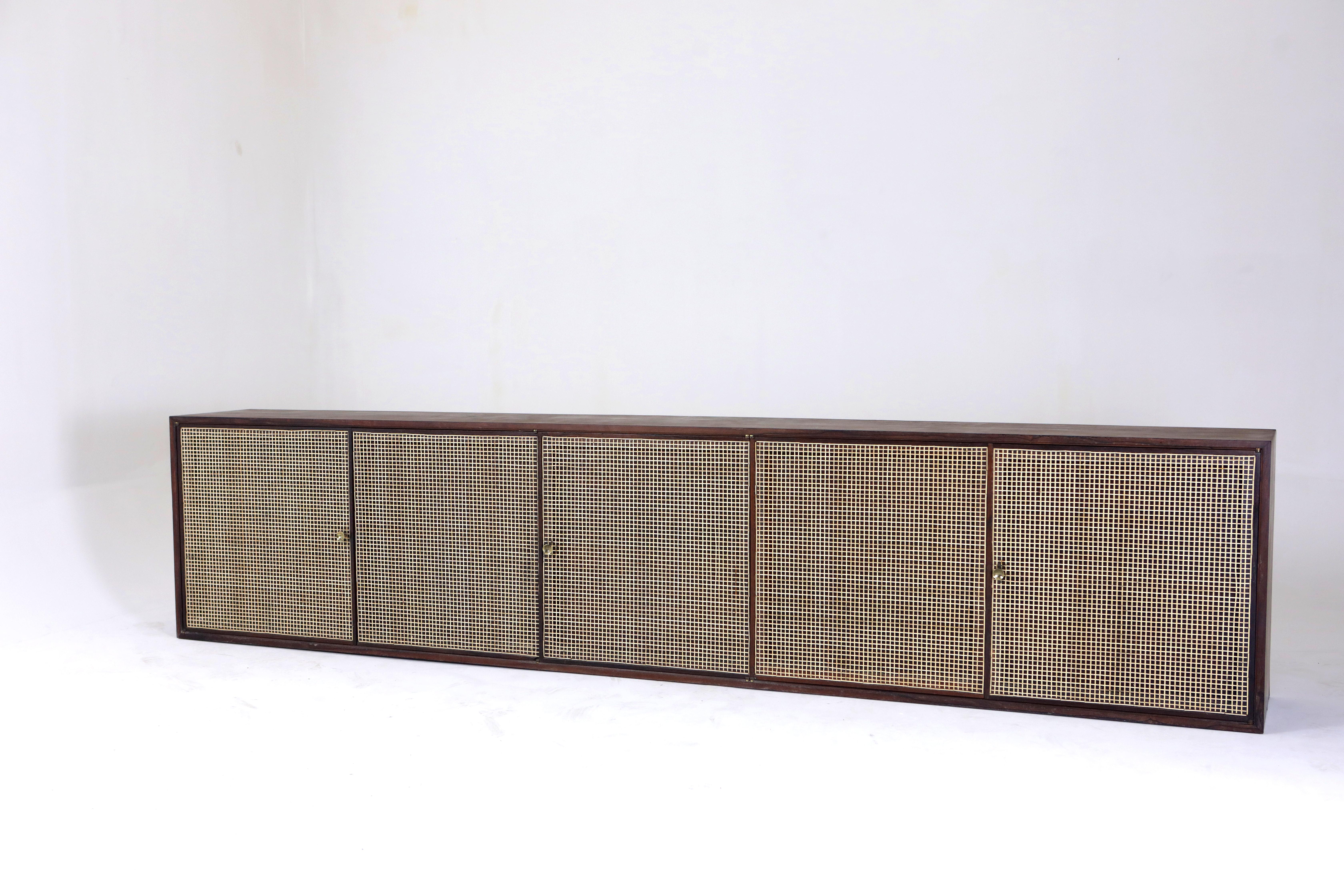 Mid-Century Modern Wall-Mounted Buffet by Forma Manufacture, Brazil, 1960s

This Wall-Mounted Buffet by Forma Manufacture is structured in wood and finished with a natural varnish, enhancing the wood's organic textures and tones. The standout