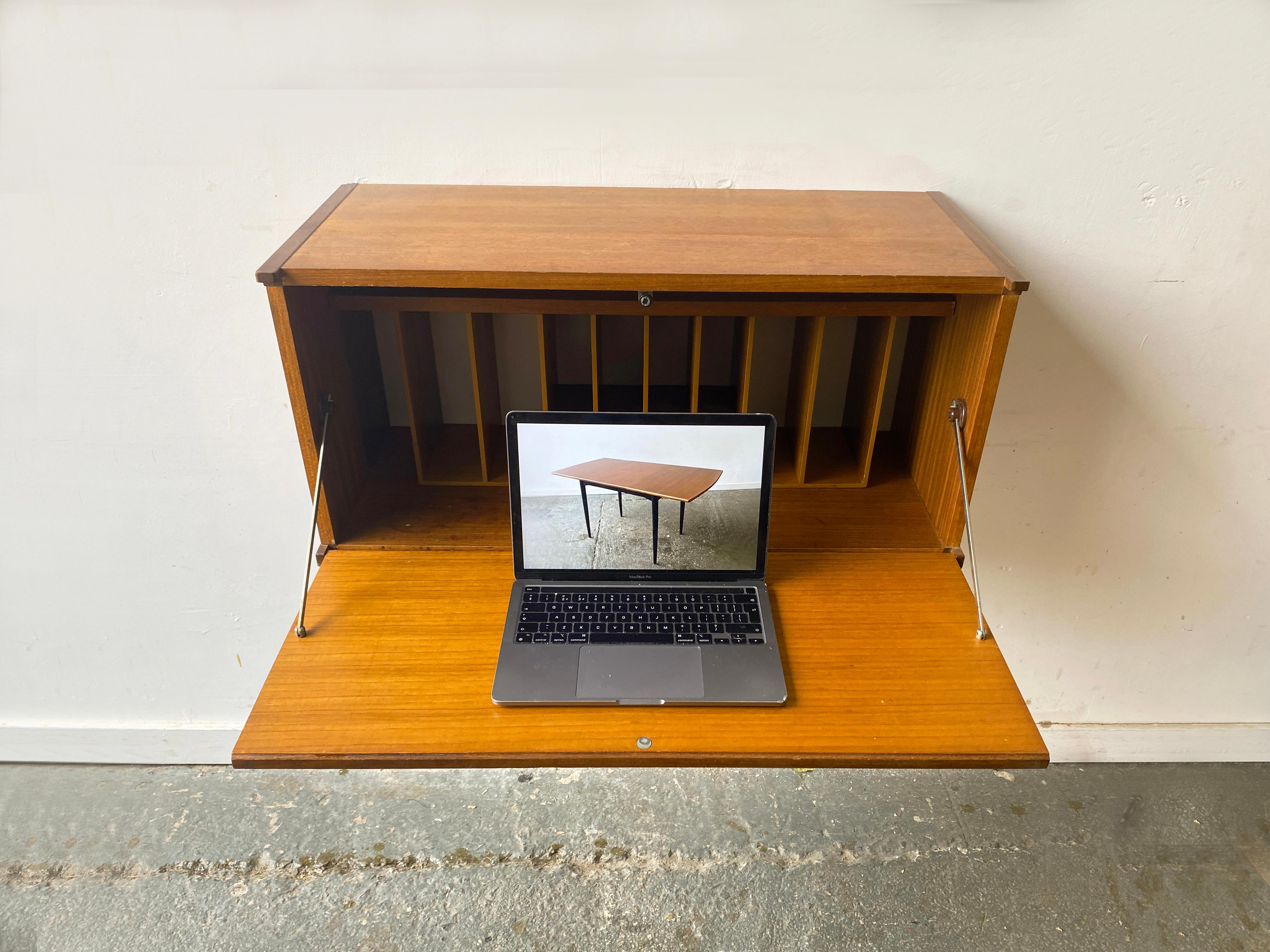 20th Century Mid-Century Modern wall mounted desk unit by Beaver and Tapley For Sale