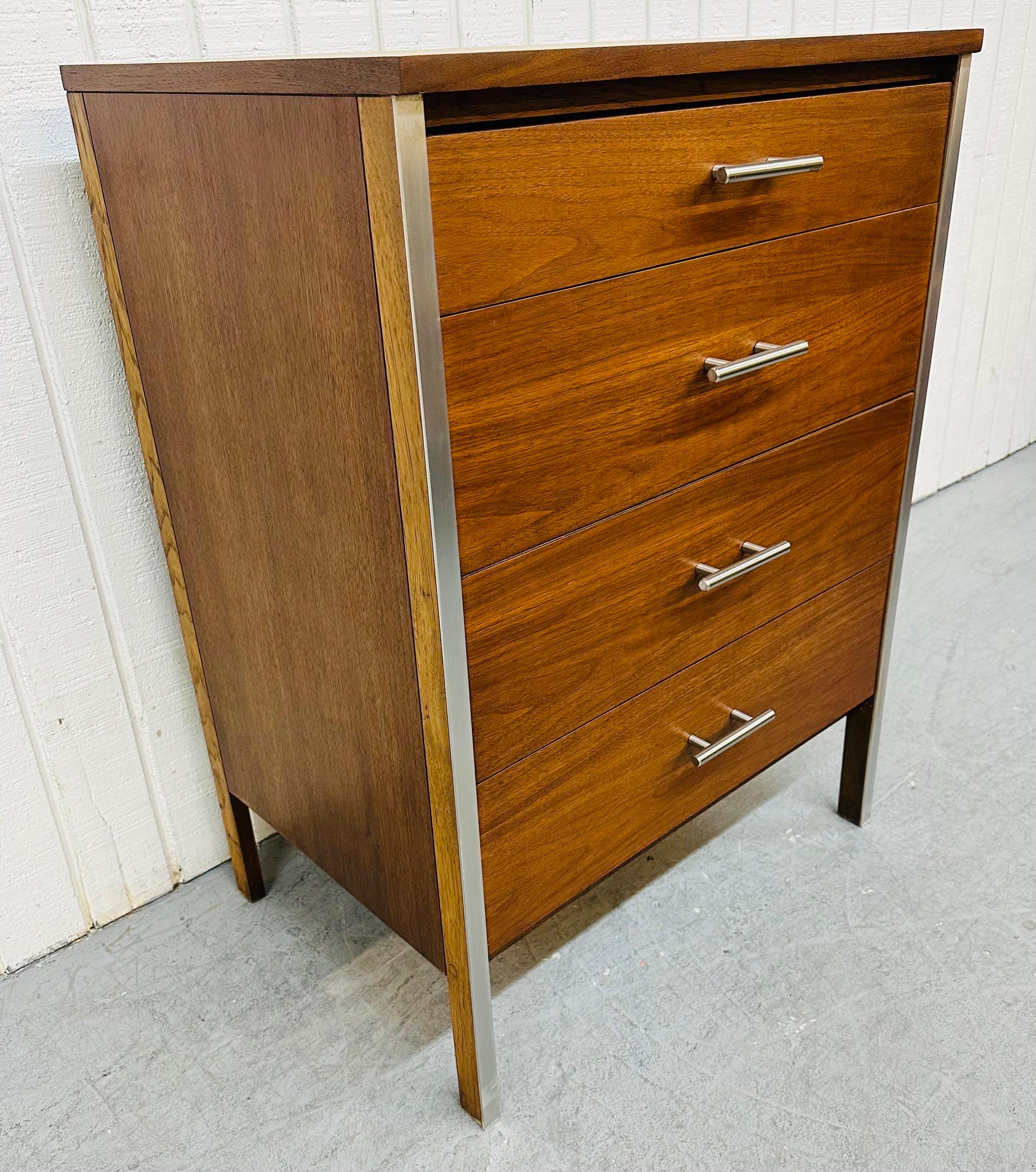 This listing is for a Mid-Century Modern Walnut 4-Drawer Chest. Featuring a rectangular design, four drawers for storage, new chrome pulls, and a beautiful walnut finish. This is an exceptional combination of quality and design attributed to Paul
