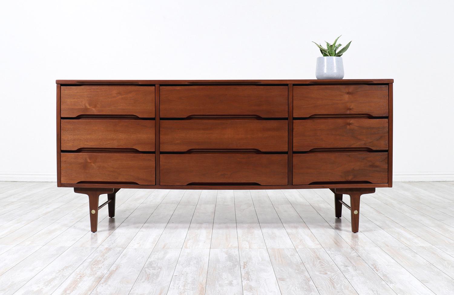 Mid-Century Modern walnut 9-drawer dresser by Stanley Furniture.