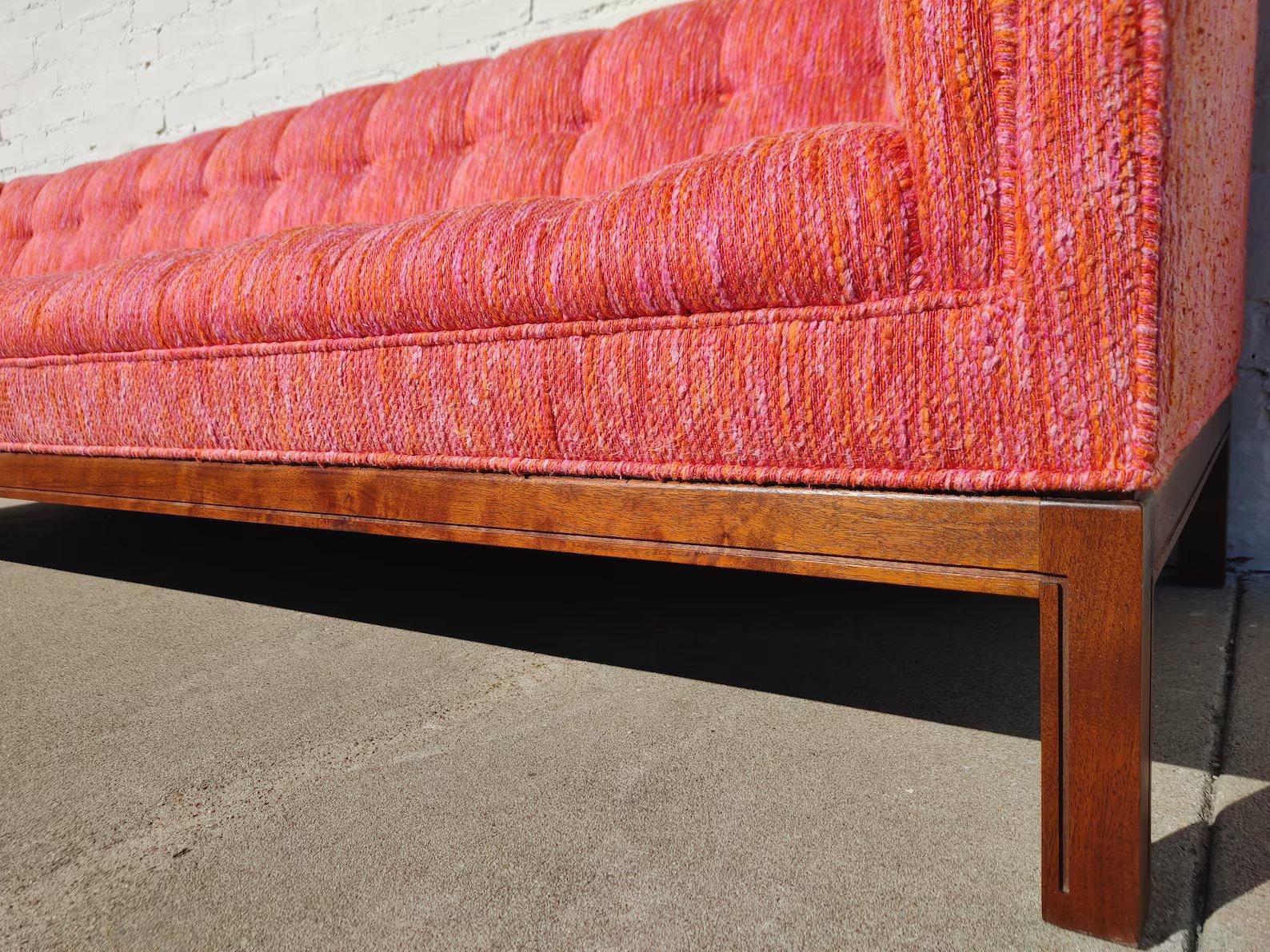 Mid Century Modern Walnut Base Tufted Sofa

Above average vintage condition and structurally sound. Upholstery in very good vintage condition. Very little wear, no tears, very little soiling. Walnut base has very little wear. Outdoor listing