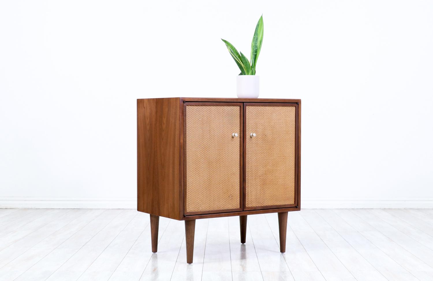 American  Expertly Restored - Mid-Century Modern Walnut Cabinet with Cane Doors For Sale