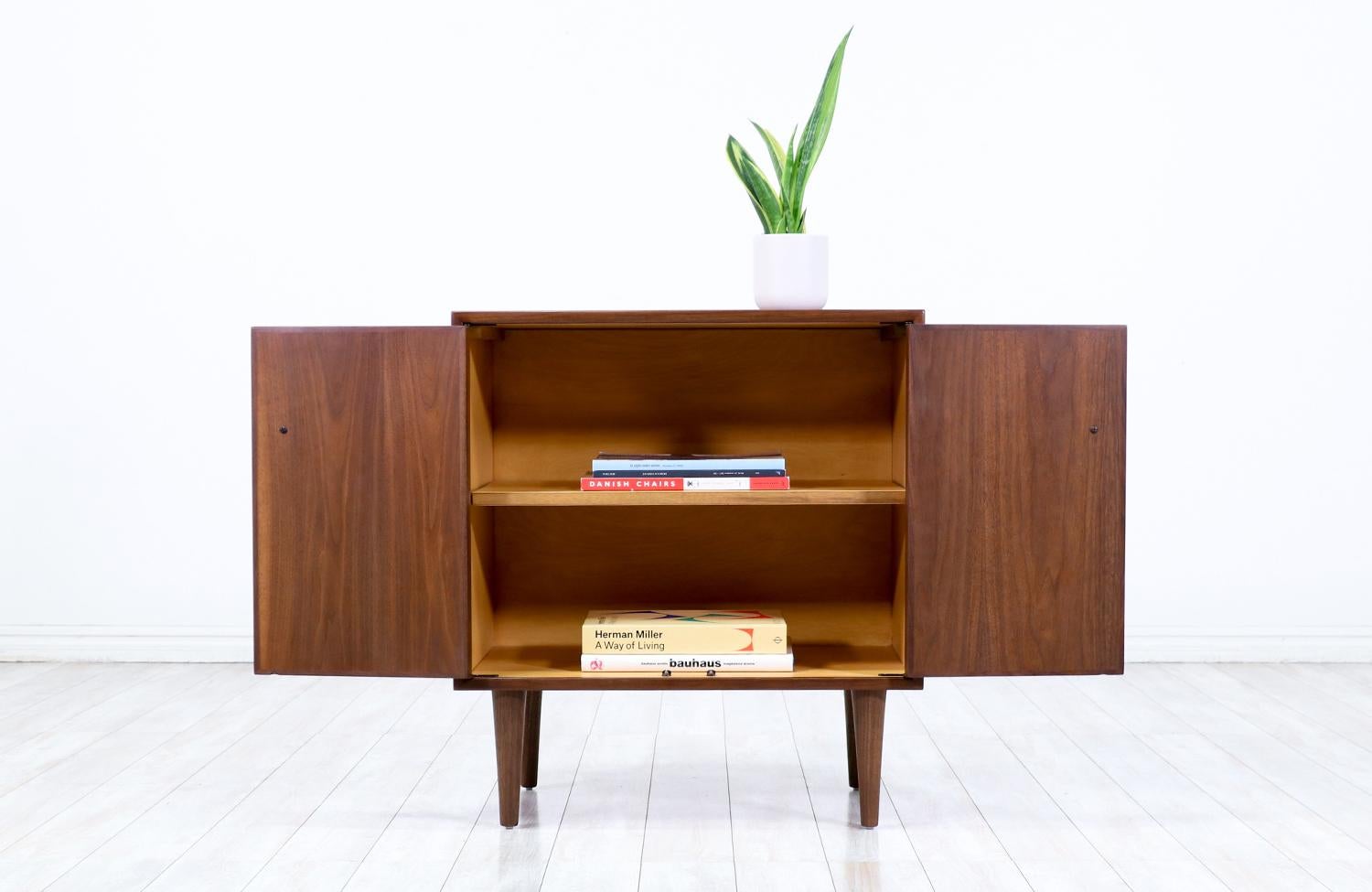 Mid-20th Century  Expertly Restored - Mid-Century Modern Walnut Cabinet with Cane Doors For Sale