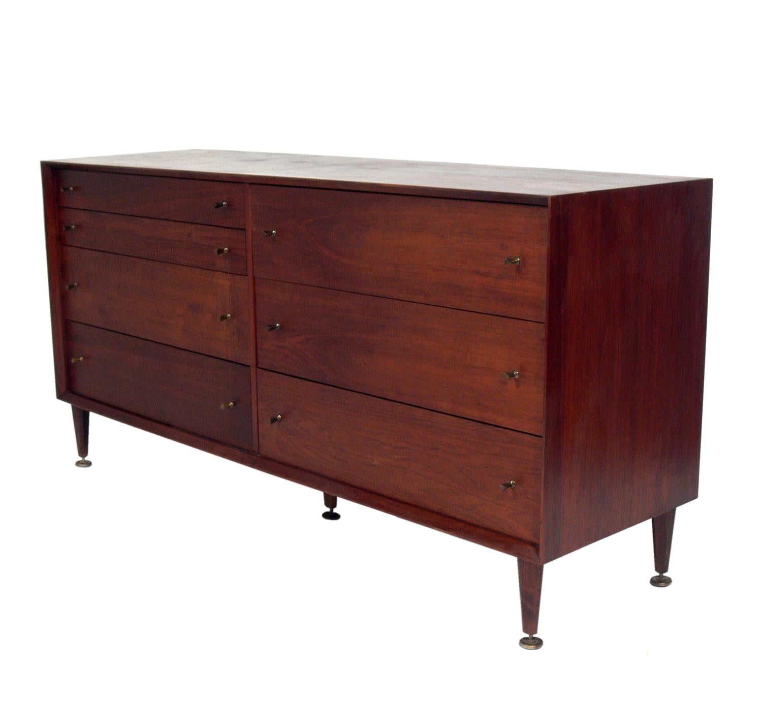 Mid-Century Modern walnut chest or dresser, designed by Marc Berge for Grosfeld House, American, circa 1960s. This chest is currently being refinished and can be completed in your choice of color. The price noted below includes refinishing in your
