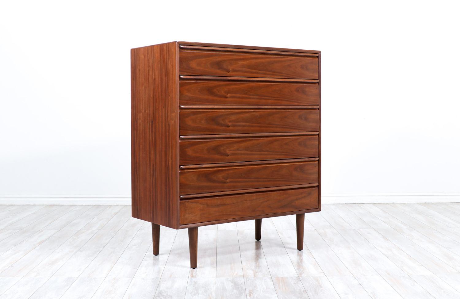 Mid-Century Modern walnut chest of drawers by Westnofa.

________________________________________

Transforming a piece of Mid-Century Modern furniture is like bringing history back to life, and we take this journey with passion and precision. With