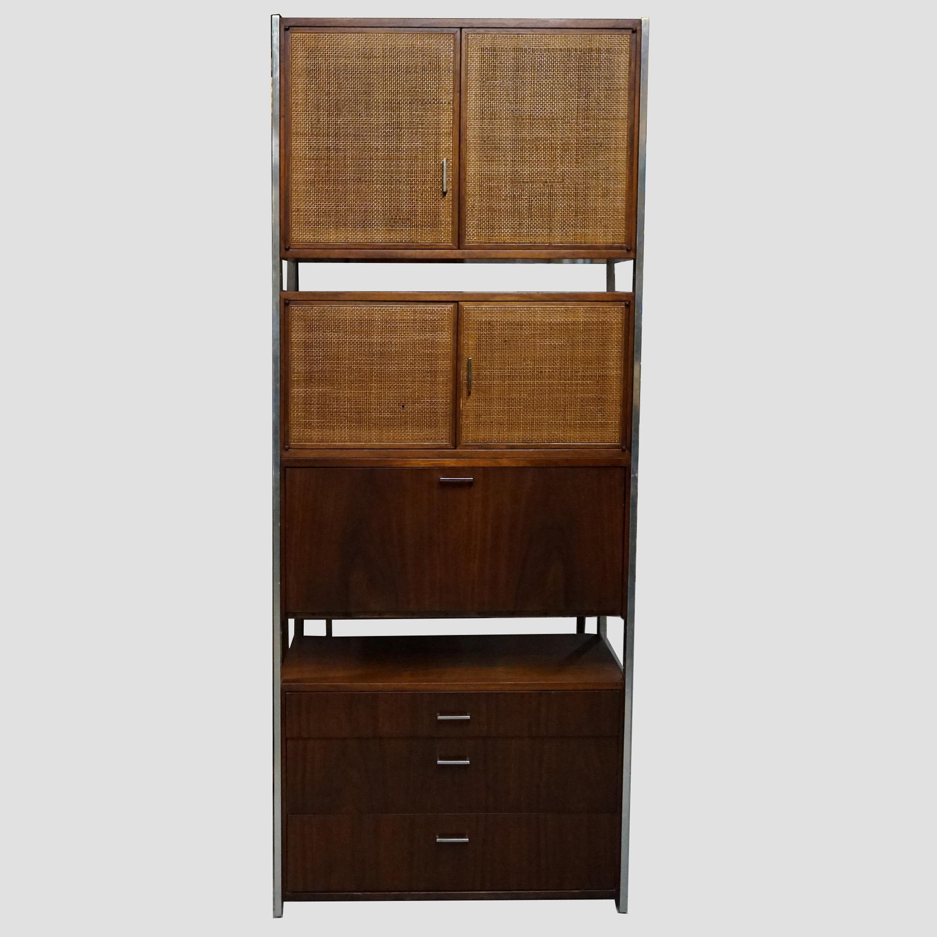 ***Ask About Discounted In-House Shipping***
A Mid Century Modern secretary offers chrome frame with walnut modular units including caned double door cabinets and drop down desk, maker mark on drawer interior as photographed, 20th century

Measures