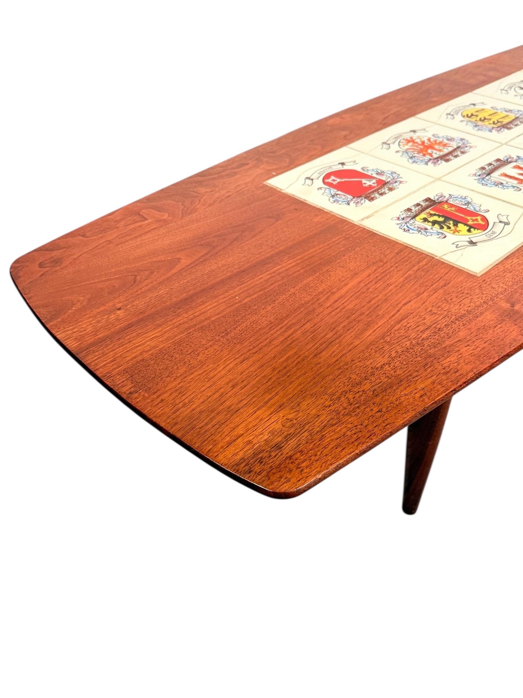 German Mid-Century Modern Walnut Coffee Table with Heraldic Tile Inlay For Sale