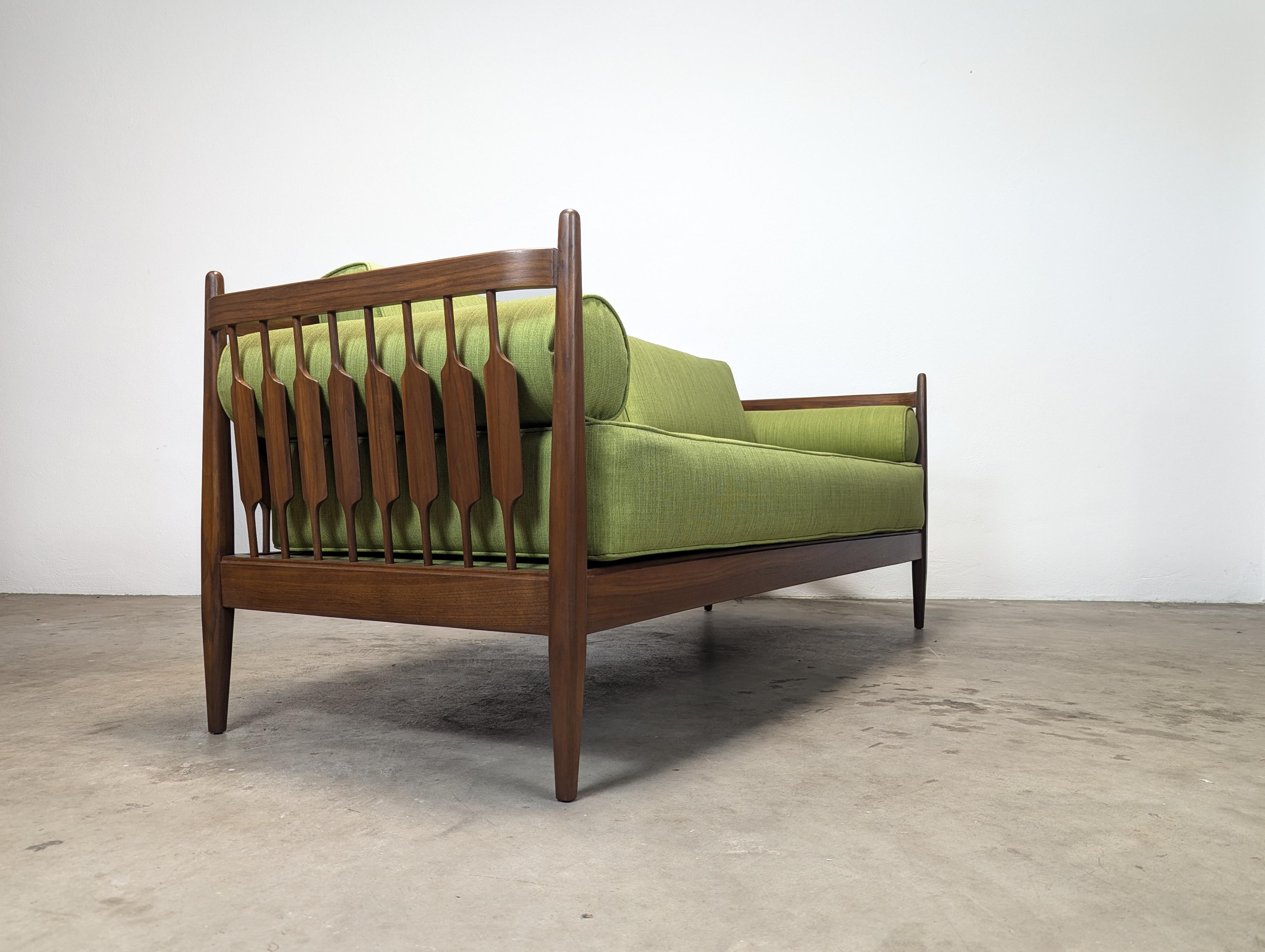 For sale is a stunning vintage Mid Century Modern Walnut Declaration Daybed, expertly designed by the renowned Kipp Stewart and Stewart MacDougall for Drexel in 1963. This exquisite piece has been meticulously refinished to perfection, ensuring it