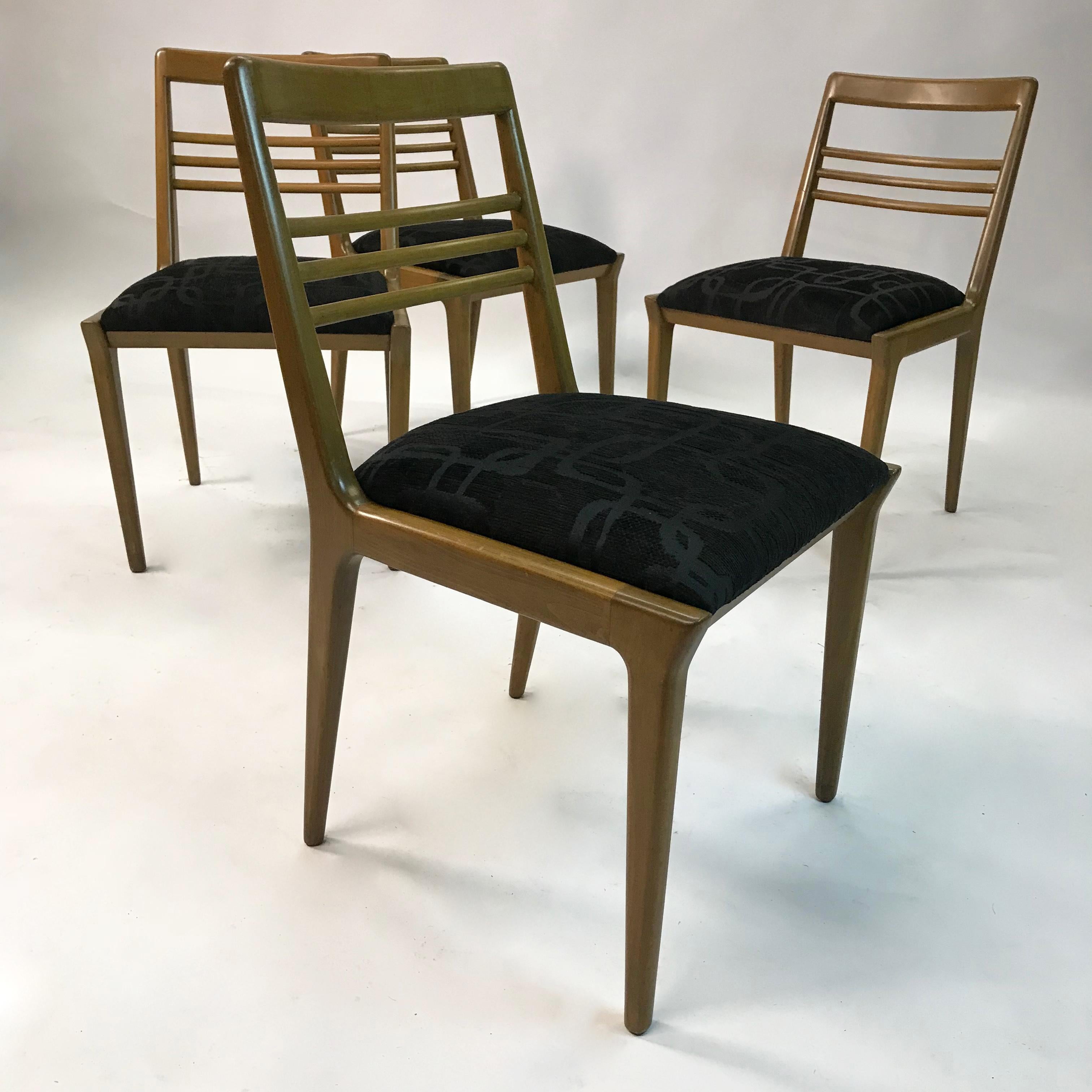 Set of 4, Mid-Century Modern, dining chairs by Kipp Stewart for Drexel feature walnut frames with newly upholstered seats in black jacquard.