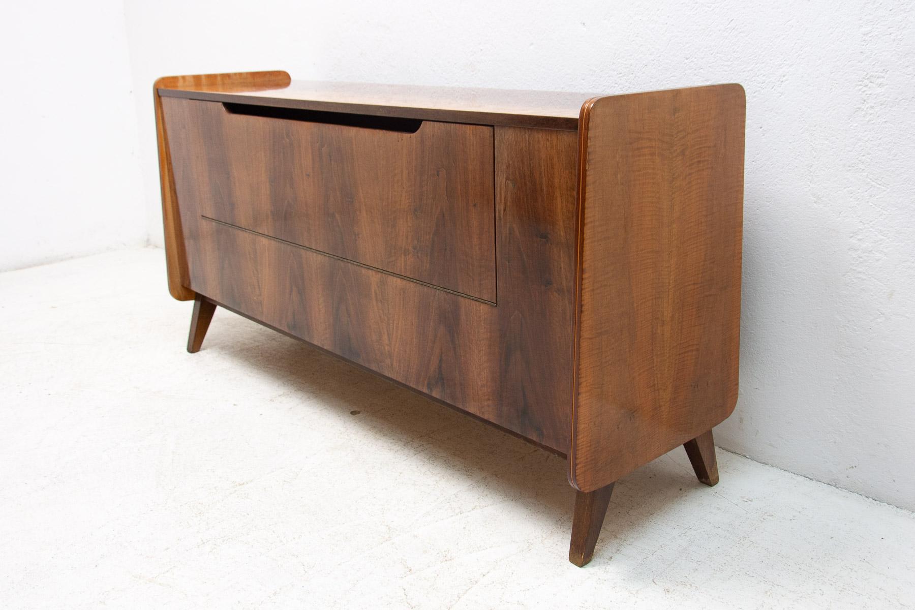 Mid-Century Modern walnut dresser by Frantisek Jirak for Tatra nabytok. Made in the former Czechoslovakia during the 1960´s. The dresser is a part of living set. The furniture is primarily intended as a chest of drawers, but it can also be used as a