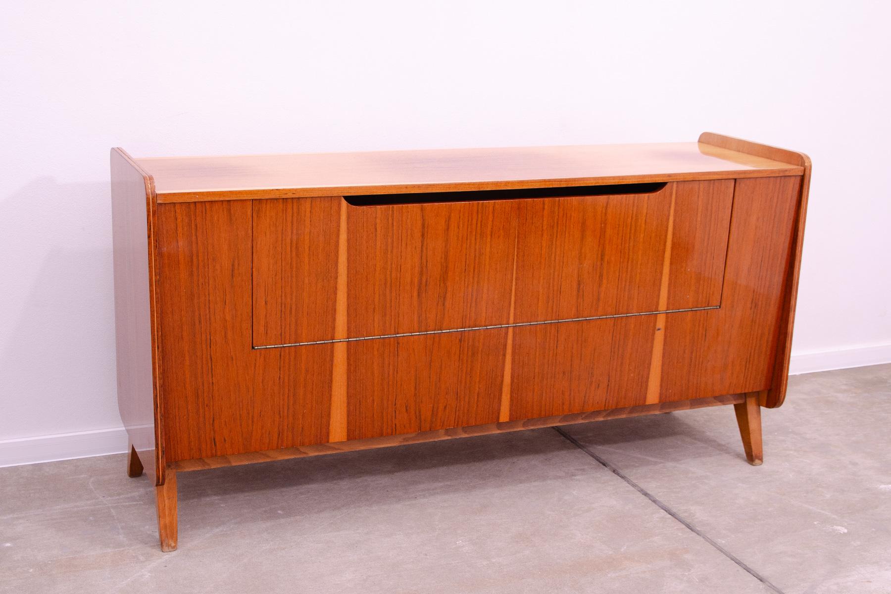 Mid century modern walnut dresser by Frantisek Jirak for Tatra nabytok. Made in the former Czechoslovakia during the 1960´s. The dresser has been part of the living set. The furniture can also be used as a TV cabinet and the like. It´s made of