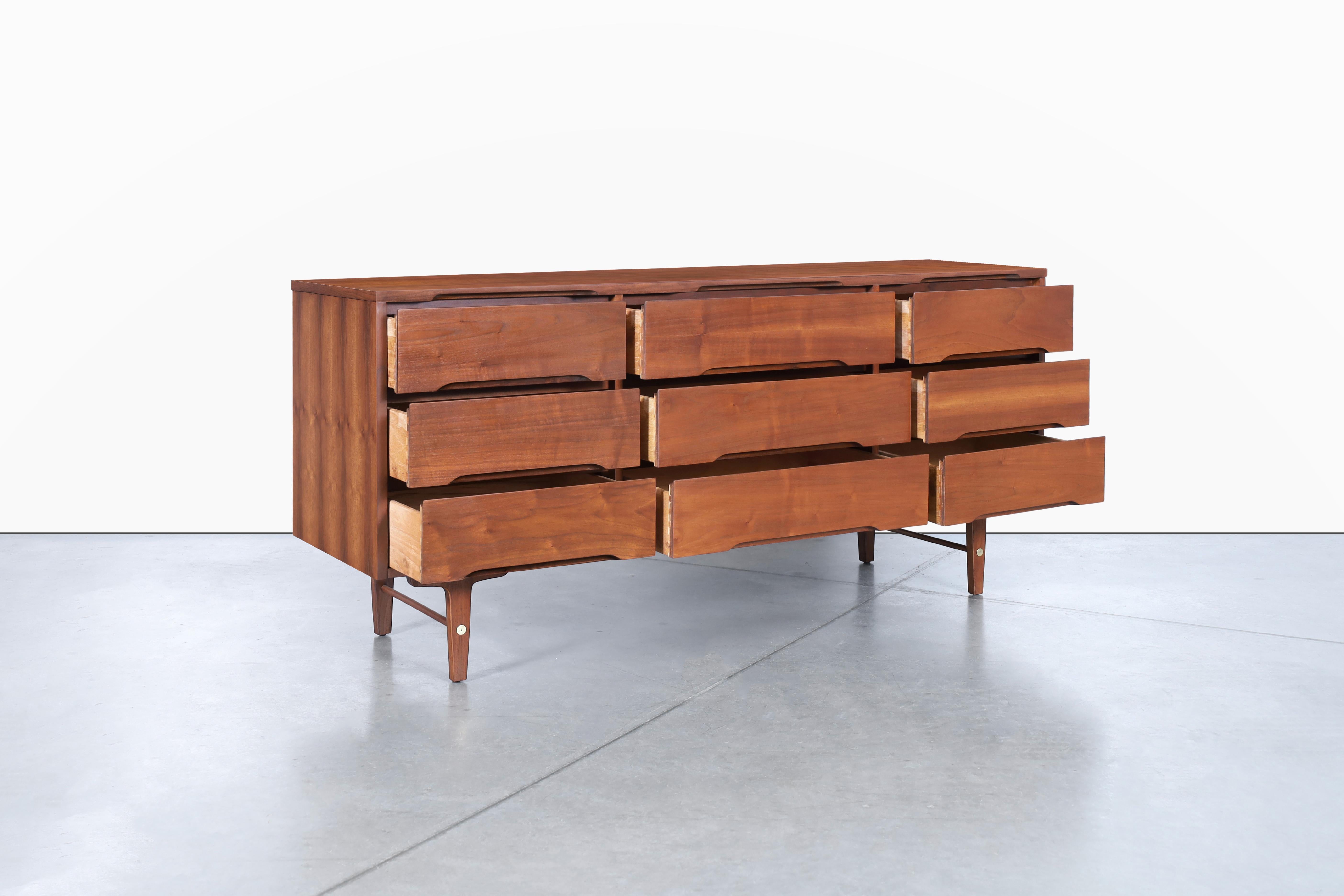 Brass Mid-Century Modern Walnut Dresser by Stanley Furniture For Sale
