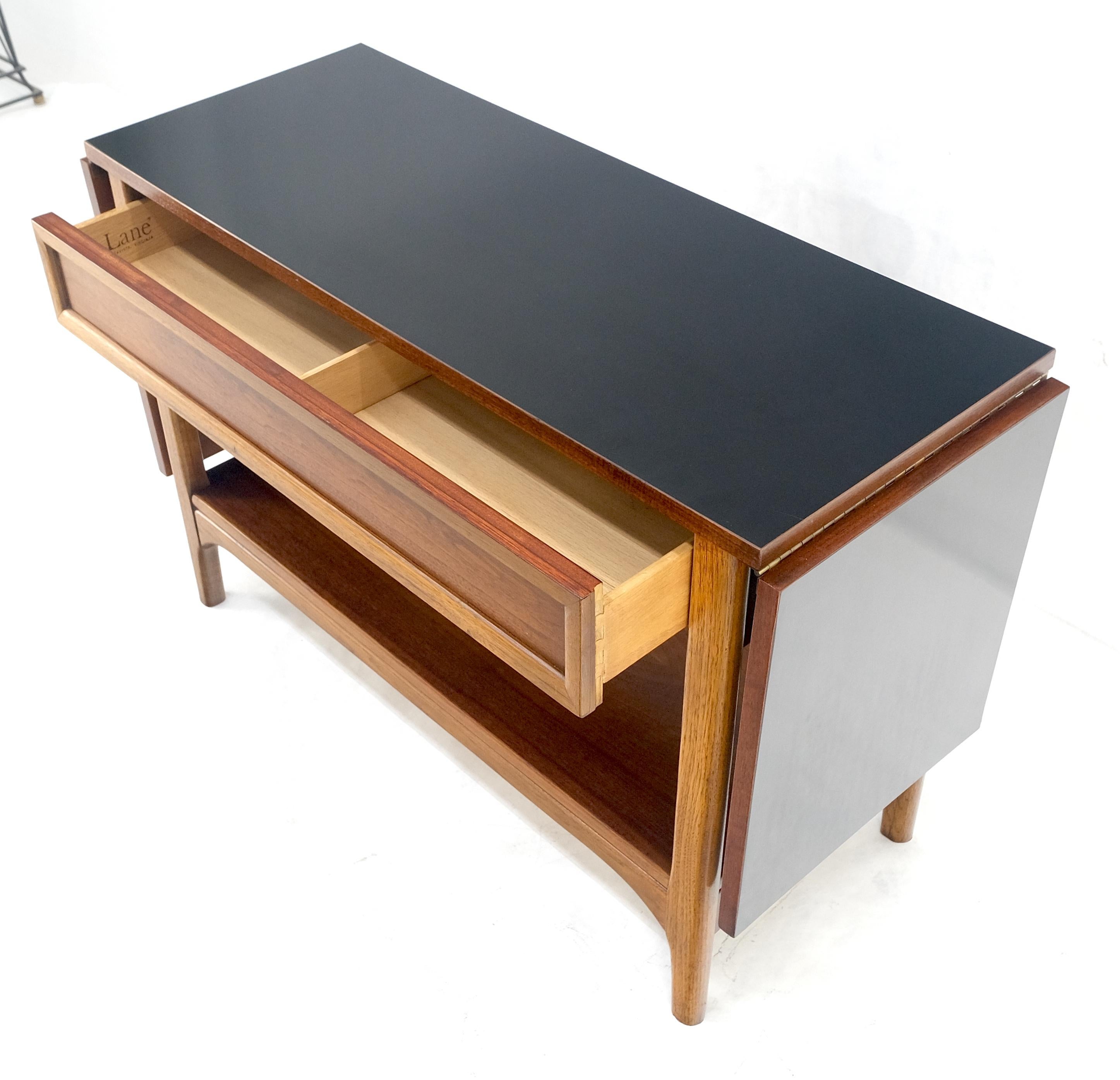 Mid Century Modern Walnut Drop Leaf One Drawer Serving Table Server MINT
2x17” leaves with an extended table length of 72”