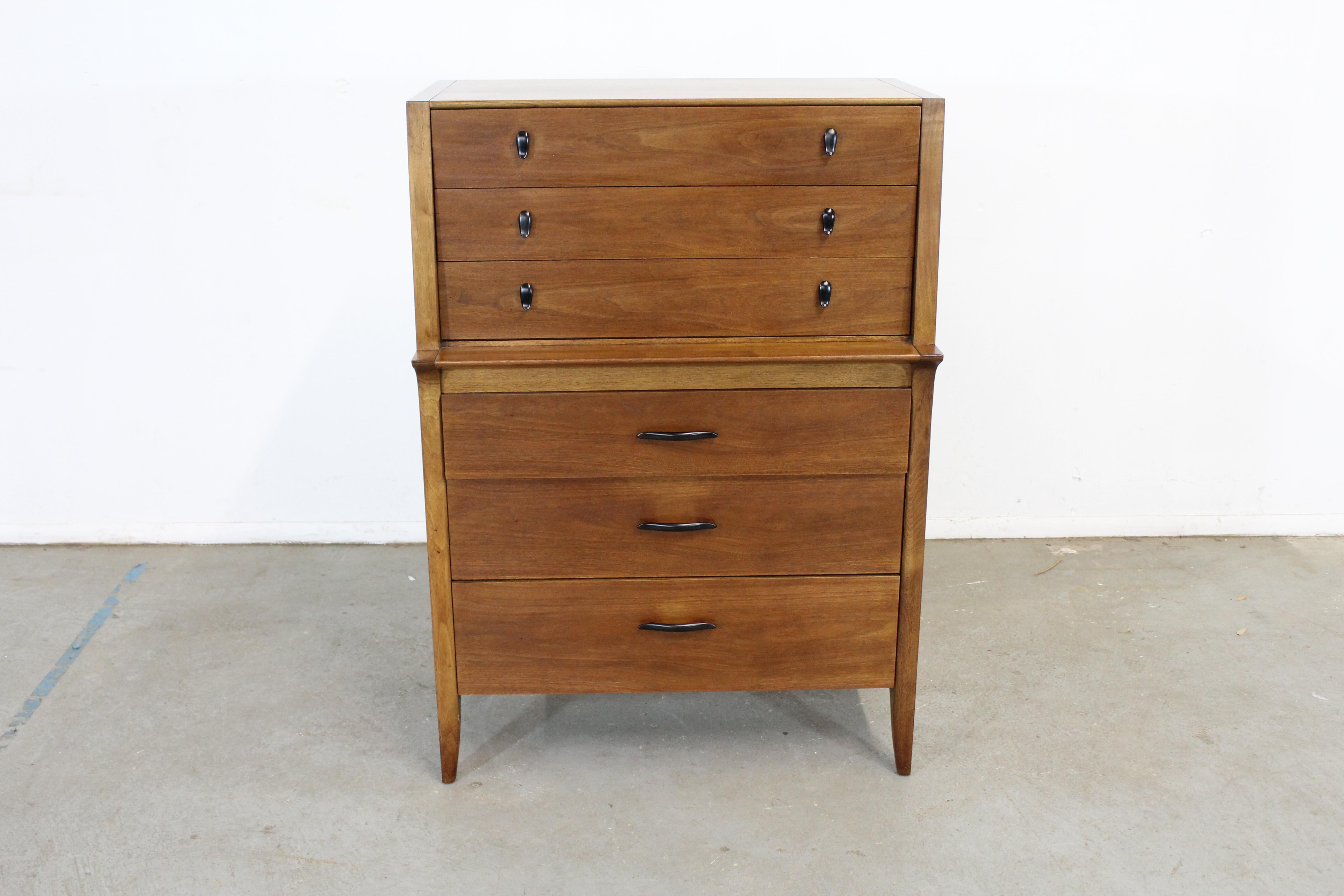 Mid-Century Modern Walnut John Van Koert tall chest

Offered is a beautiful Mid-Century Modern Walnut John Van Koert tall chest with ample storage space, which was manufactured by Drexel. Features six drawers. It has been refinished and is in good
