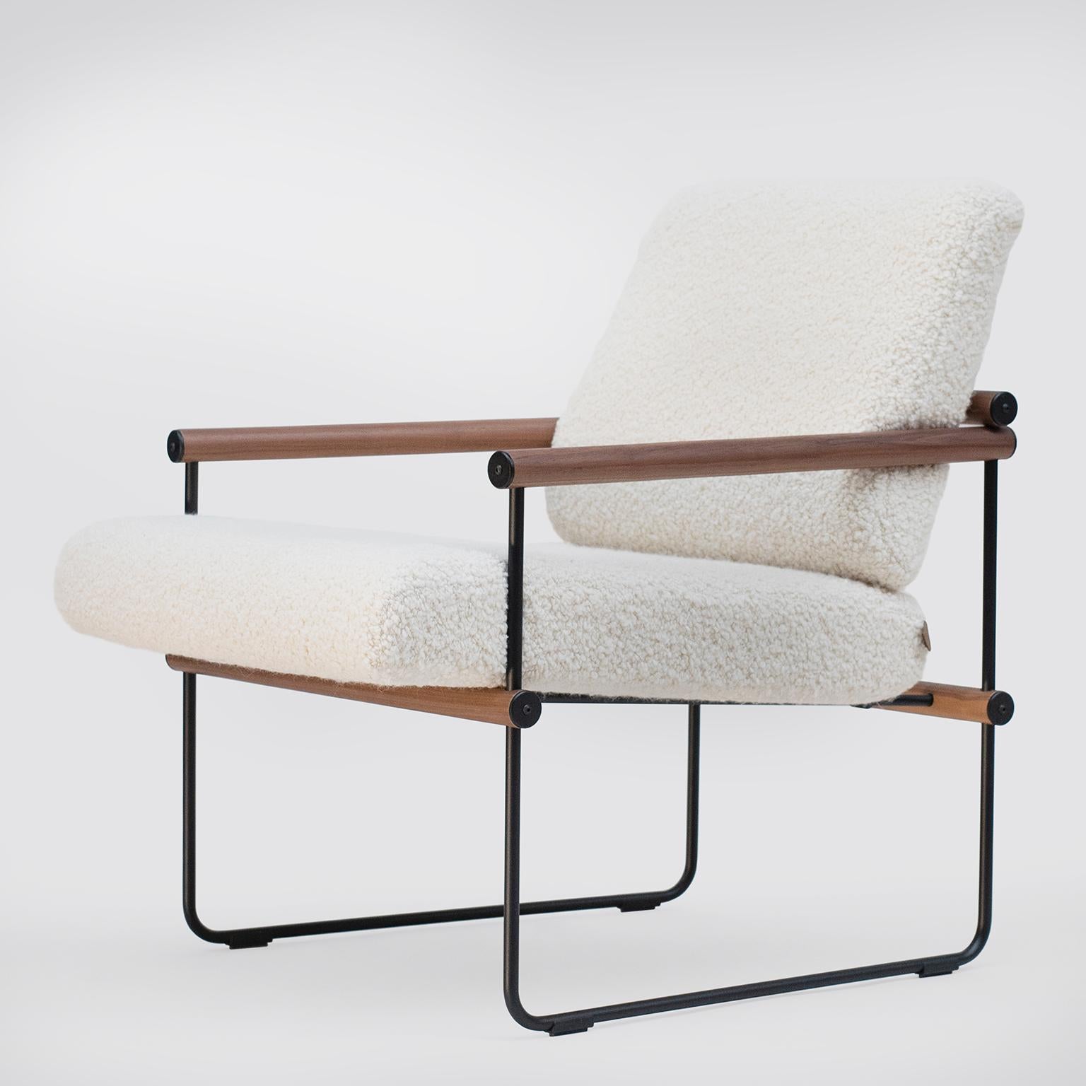 This mid-century modern 'Audrey' S12 is a comfortable light-weight armchair designed by Peter Ghyczy in 2017 and hand-crafted in the GHYCZY atelier in the South of the Netherlands. Since coming on the market in 2017 the 'Audrey' S12 has remained a