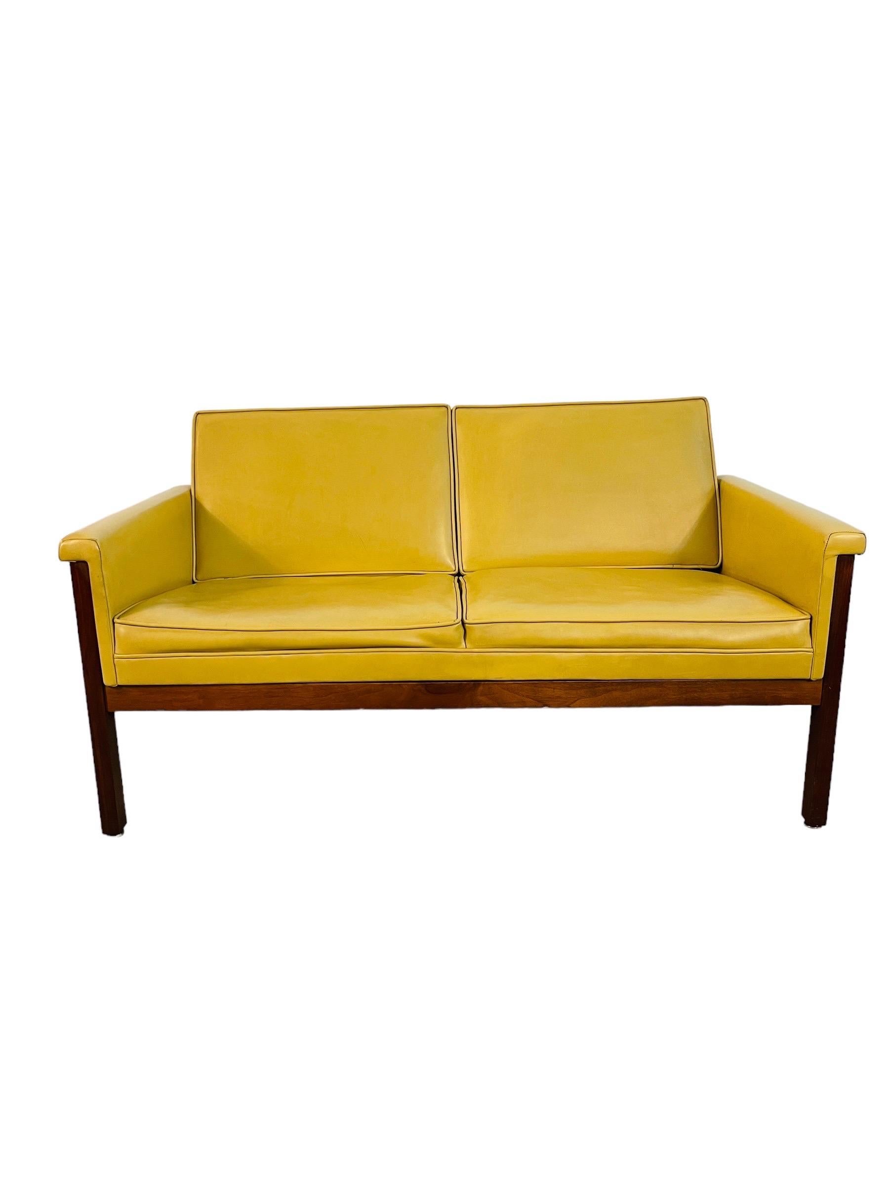 Introducing the latest showstopper at Heirloom Decor – the Thonet walnut loveseat. This Mid Century marvel pairs bold, sunny upholstery with the timeless elegance of a walnut frame. A perfect fusion of comfort and style, it promises to be the