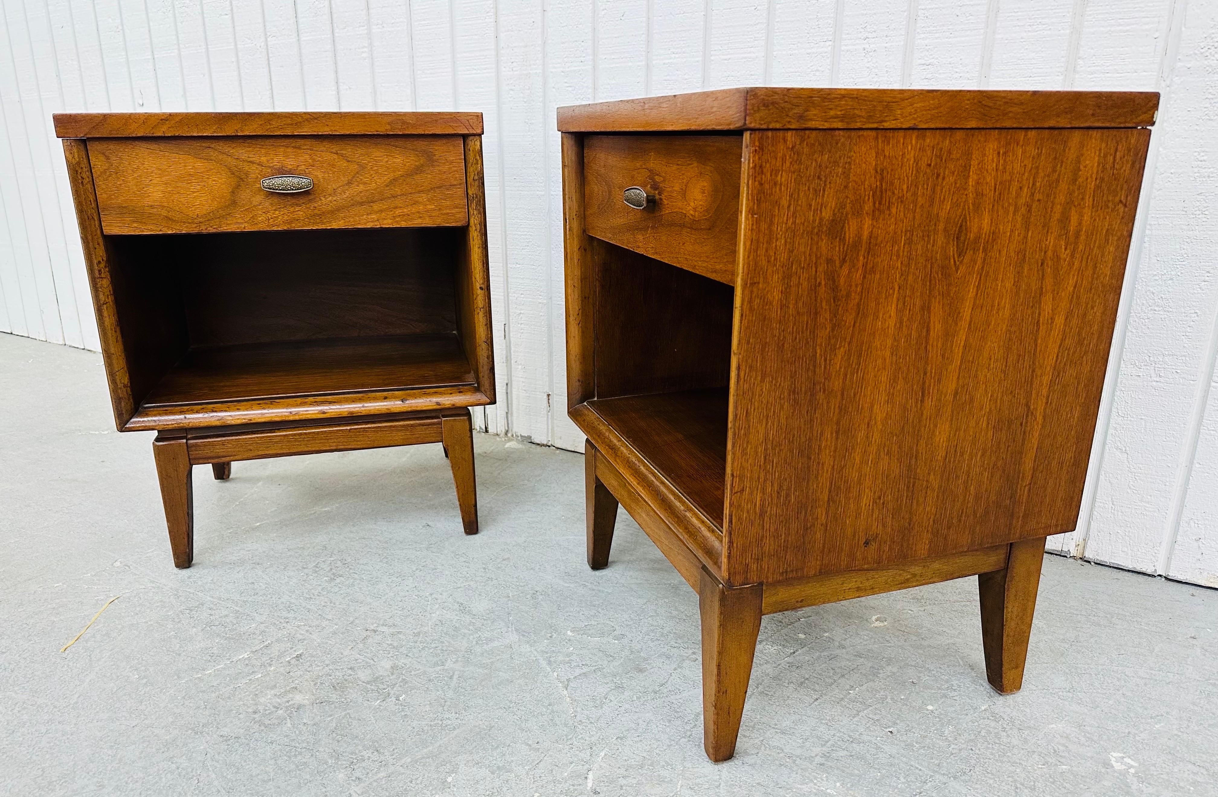 This listing is for a pair of Mid-Century Modern Walnut Nightstands. Featuring a straight line design, single drawer with original hardware, open storage space, modern legs, and a beautiful walnut finish. This is an exceptional combination of