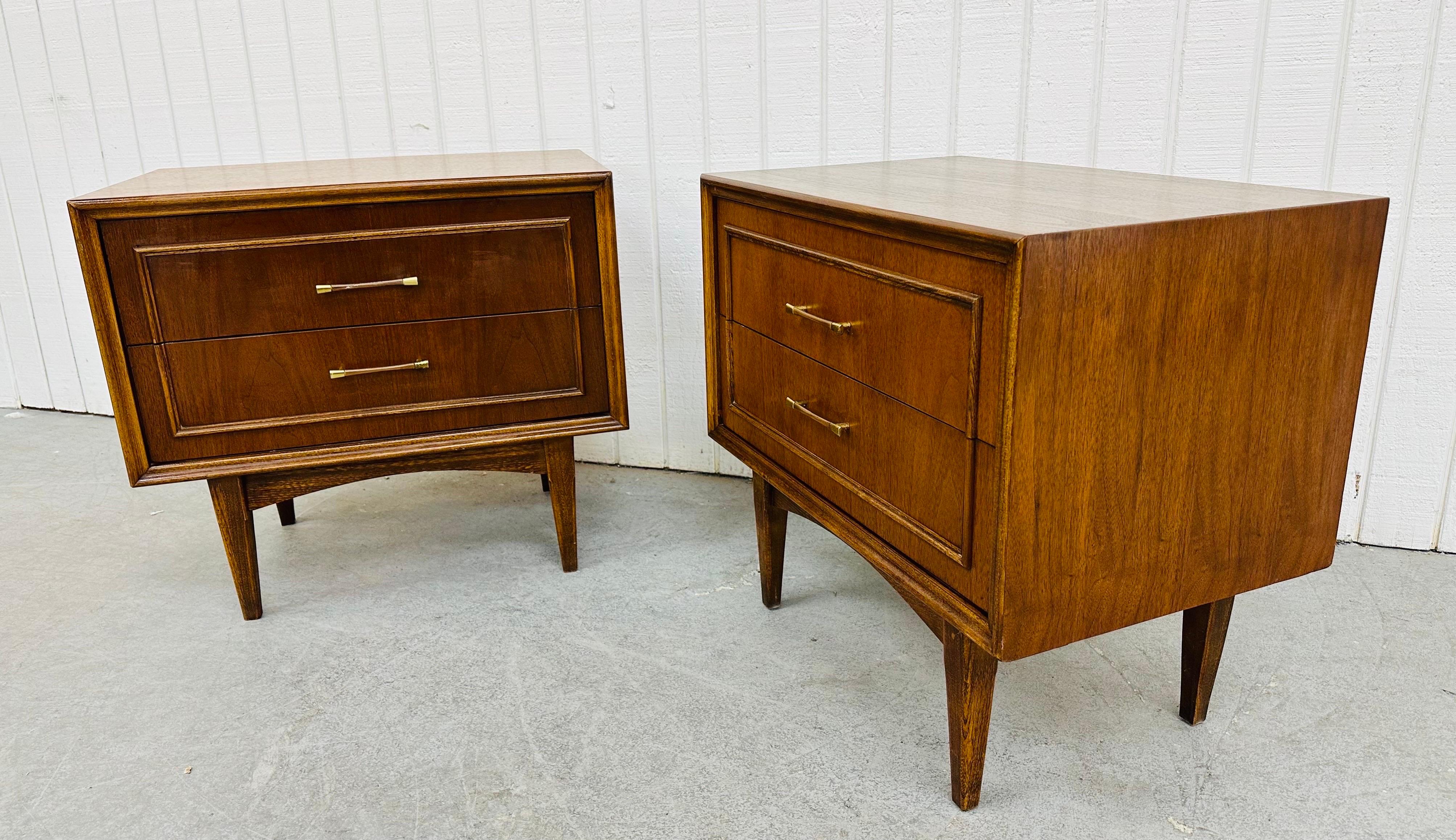 This listing is for a pair of Mid-Century Modern Walnut Nightstands. Featuring a straight line design, two drawers for storage, original brass pulls, modern legs, and a beautiful walnut finish. This is an exceptional combination of quality and