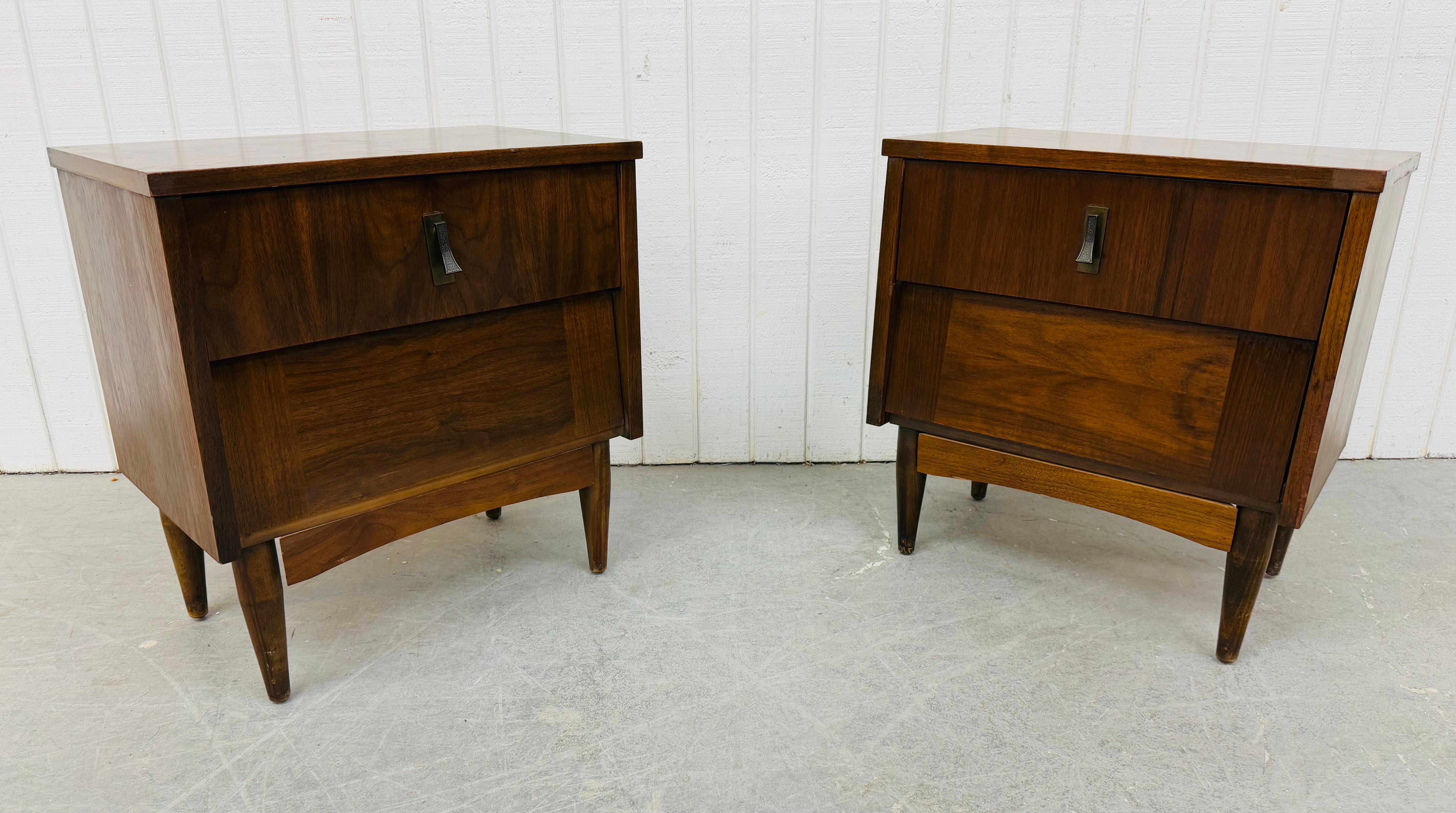 This listing is for a pair of Mid-Century Modern Walnut Nightstands. Featuring a straight line design, two drawers for storage, original hardware, modern legs, and a beautiful walnut finish. This is an exceptional combination of quality and MCM