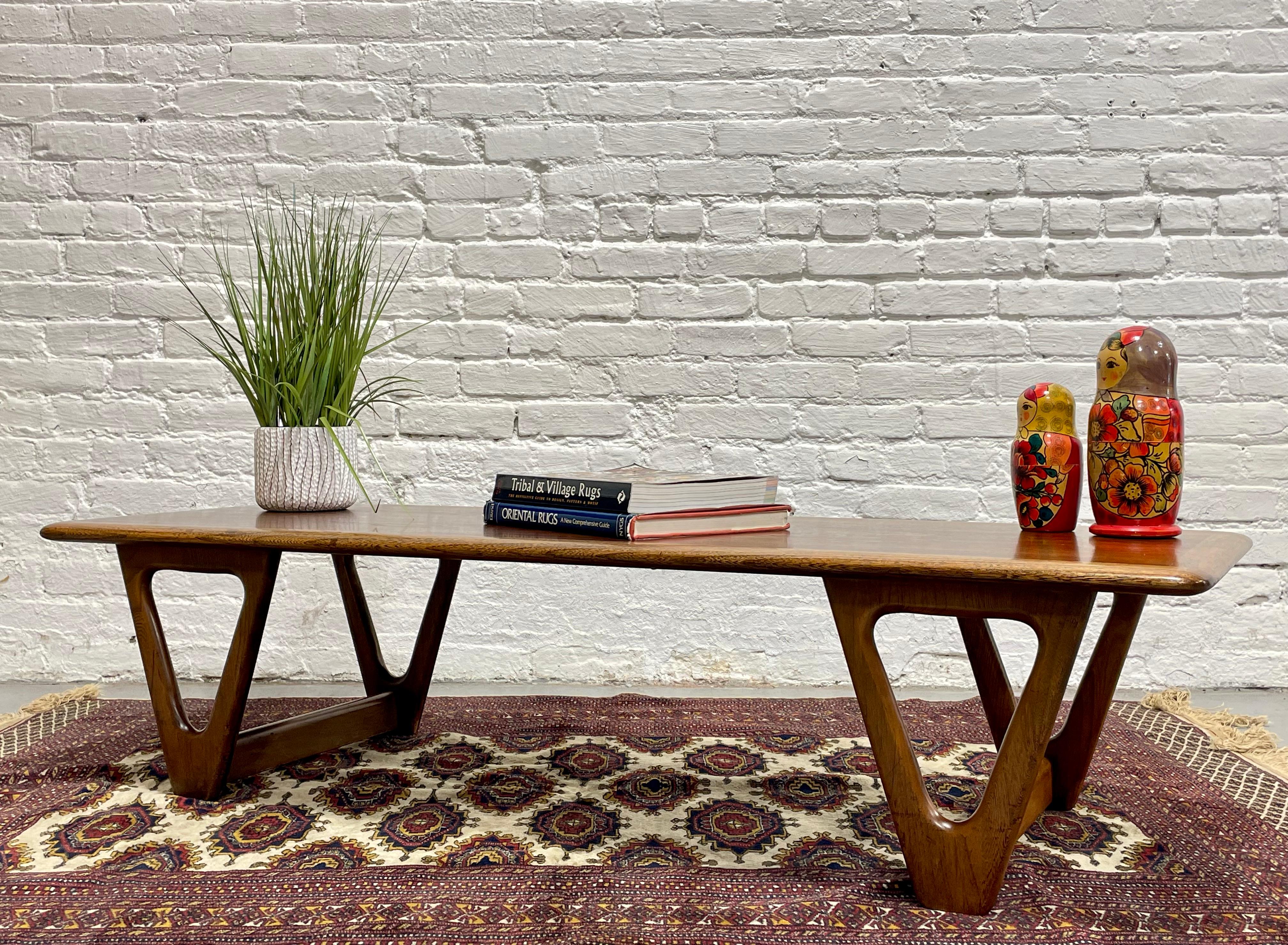 Mid Century Modern Walnut and Oak Coffee Table by Warren Church for Lane Perception.  The triangular, rounded edge legs are the focal point of this incredible piece.  The two-tone tabletop is newly refinished and in pristine condition. Ready to be