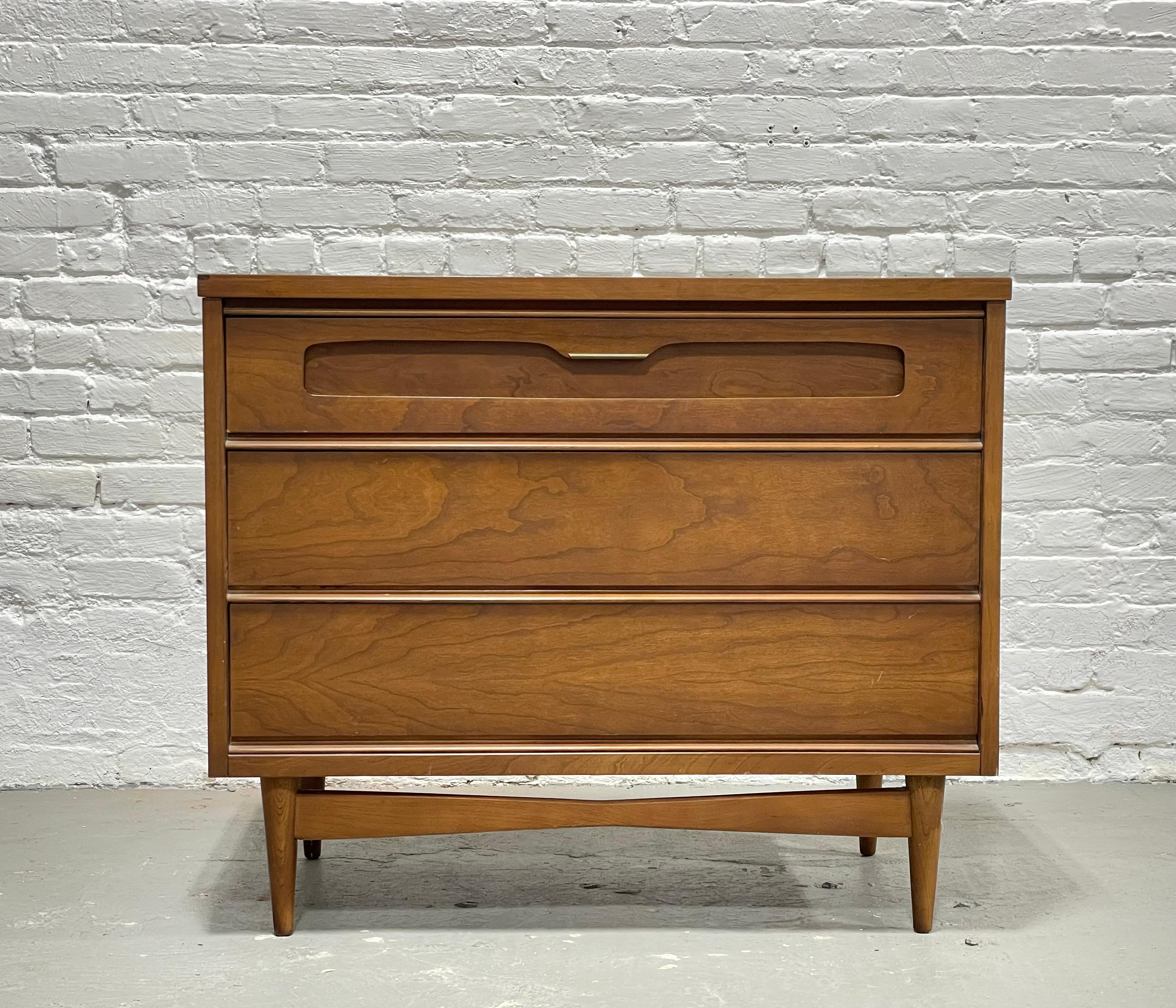 Mid Century Modern Petite Dresser by Bassett Furniture Co., c. 1960's. This thoughtful piece takes up minimal floor space yet provides three deep and spacious drawers for storage. Place in your entryway as a landing place for mail and keys or a