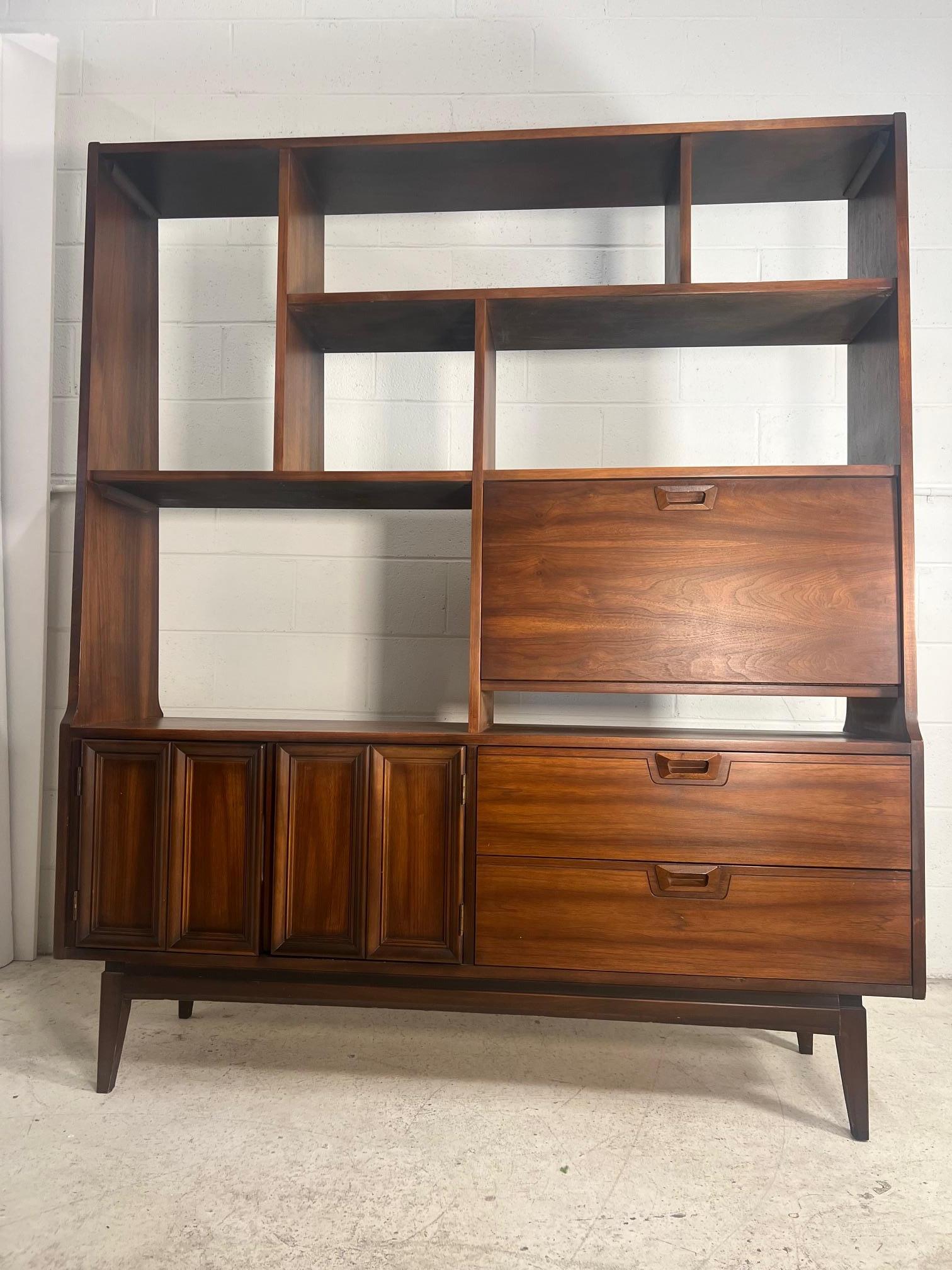 This is a stunning mid century walnut room divider. Free standing with finished back. No maker's mark but generally attributed to J.B. Van Sciver.

Fantastic condition with minimal wear. Items on the shelves and planter not