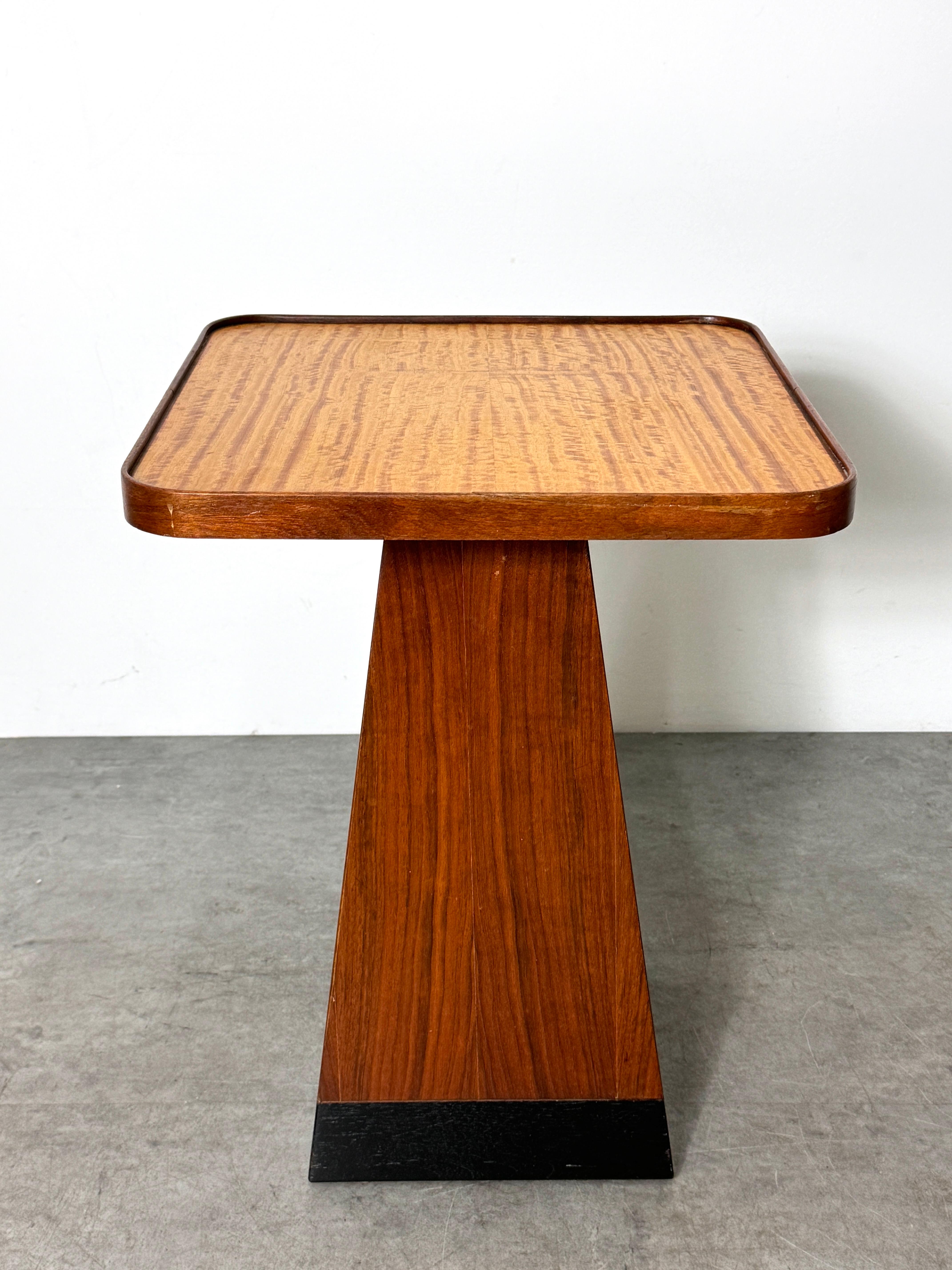 Unique vintage occasional table circa 1970s
Architectural design with walnut and ebonized wood pyramid base and square top with inset satinwood surface
Unsigned / In the style of Harvey Probber

16 x 16 inches
21.25 inch height

