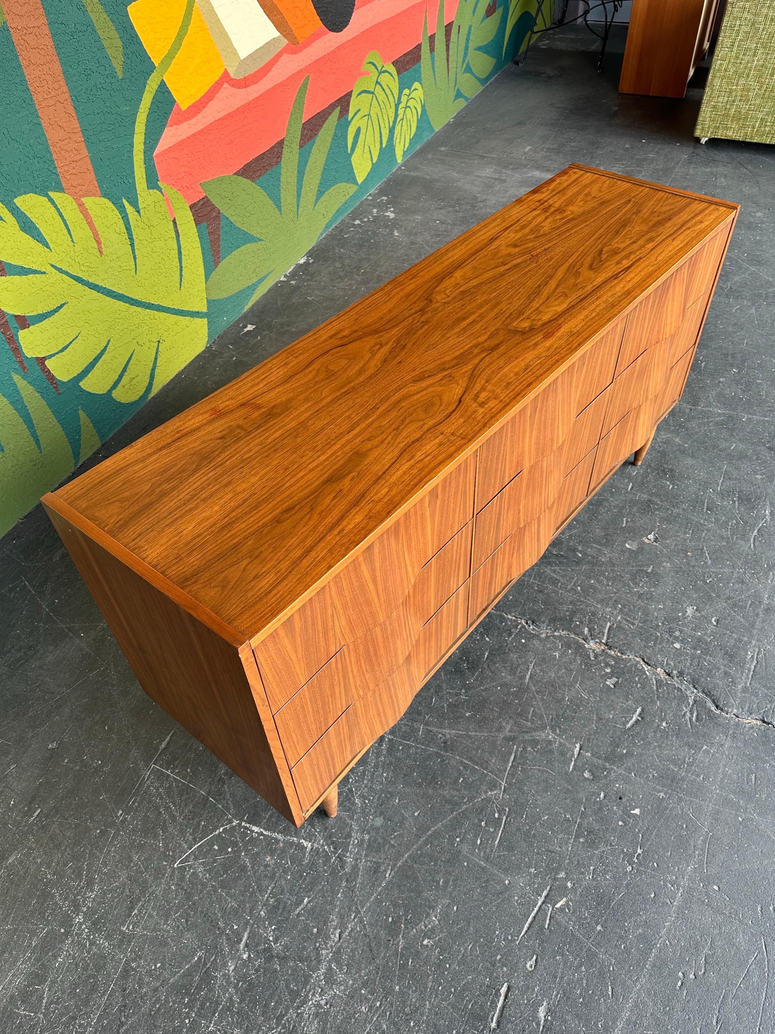 Stained Mid Century Modern Walnut Sculpted Front 9 Drawer Dresser