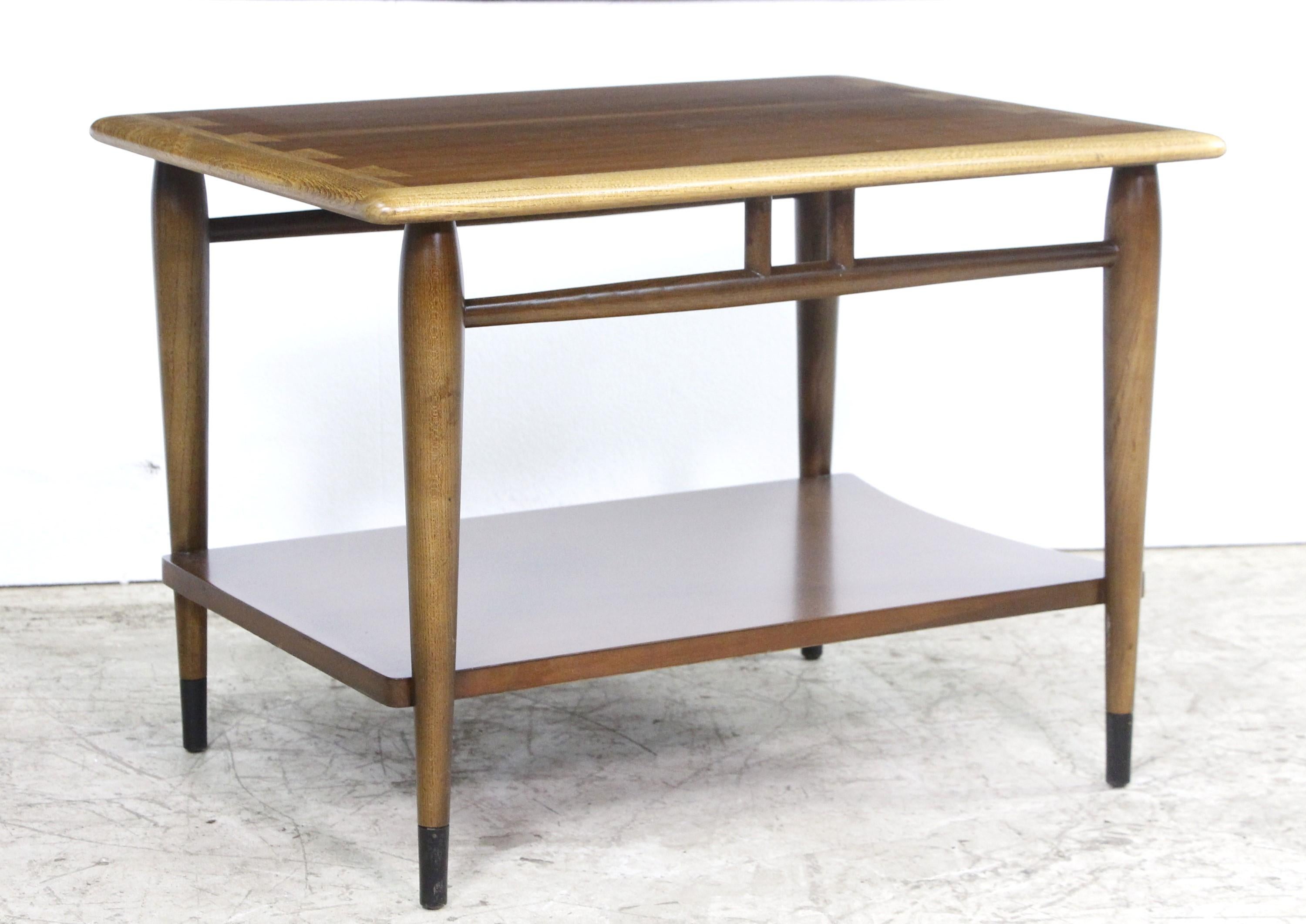 Mid-Century Modern mid 20th century side table by Lane Furniture. Can also be used as a small coffee table as it's 19.5 inches high. Patent no. 185371. Style no 900 05. Serial no. 564021. This can be seen at our 400 Gilligan St location in Scranton,