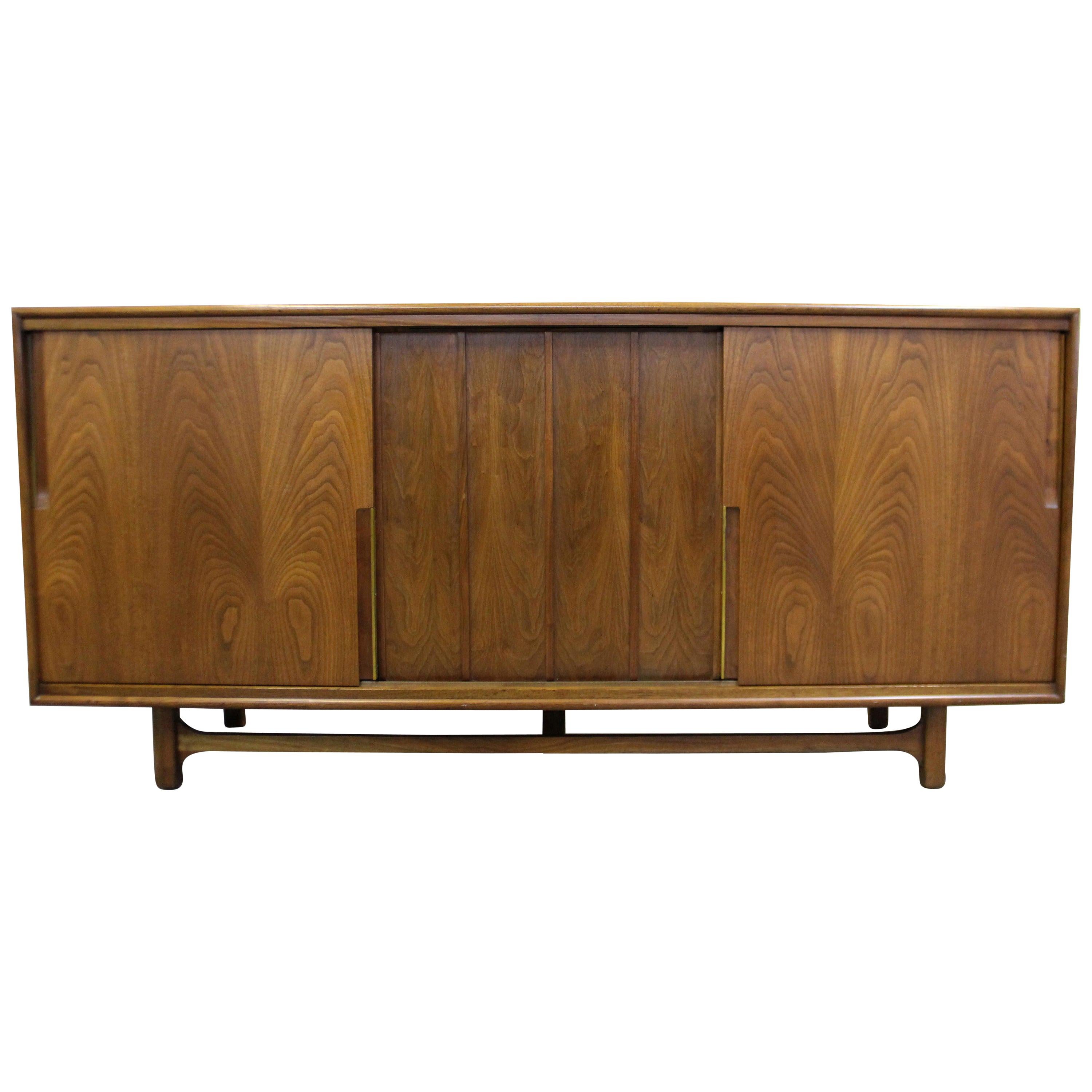 MidCentury Modern Walnut Sliding Door Credenza by Cavalier at 1stDibs