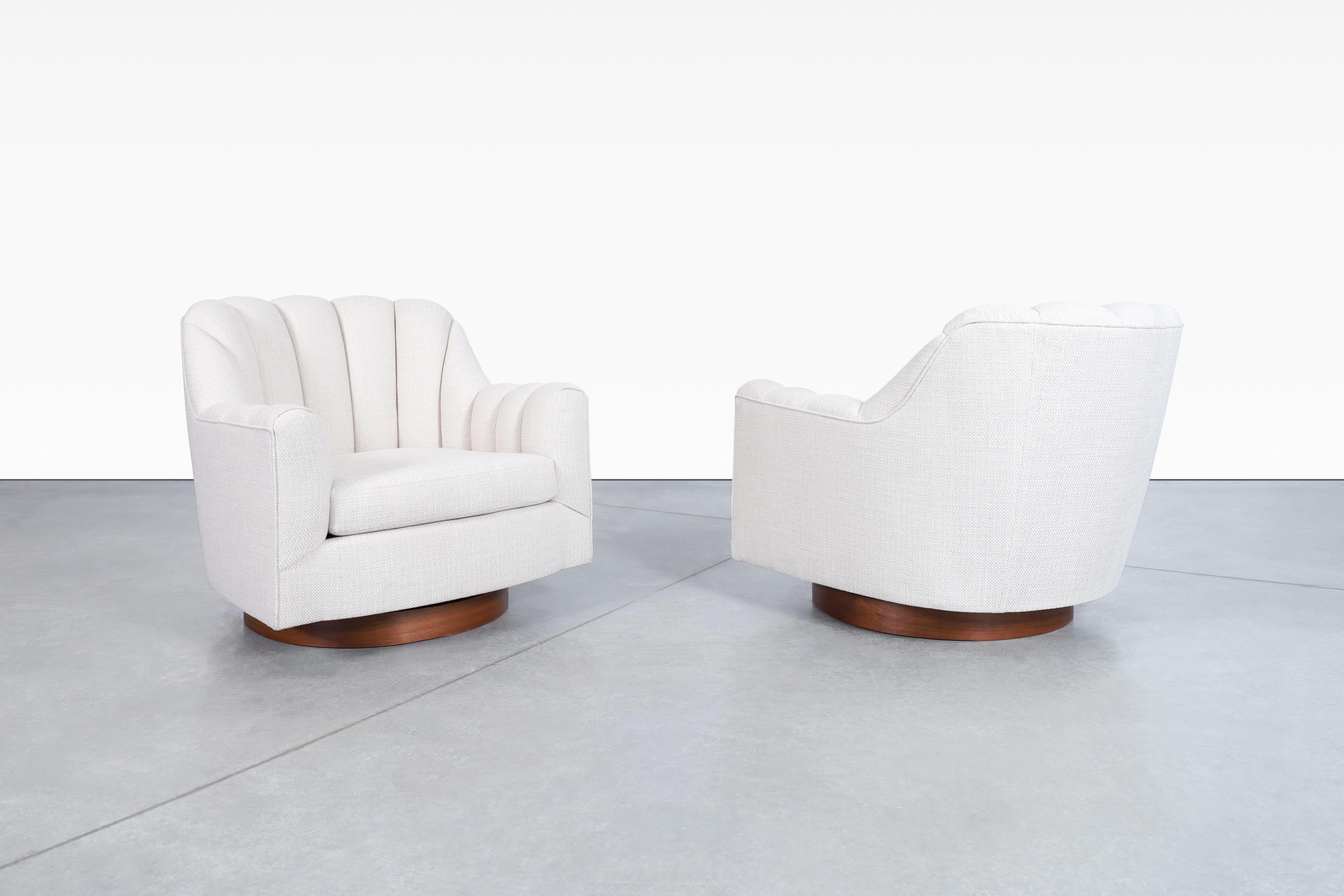 American Mid-Century Modern Walnut Swivel Lounge Chairs