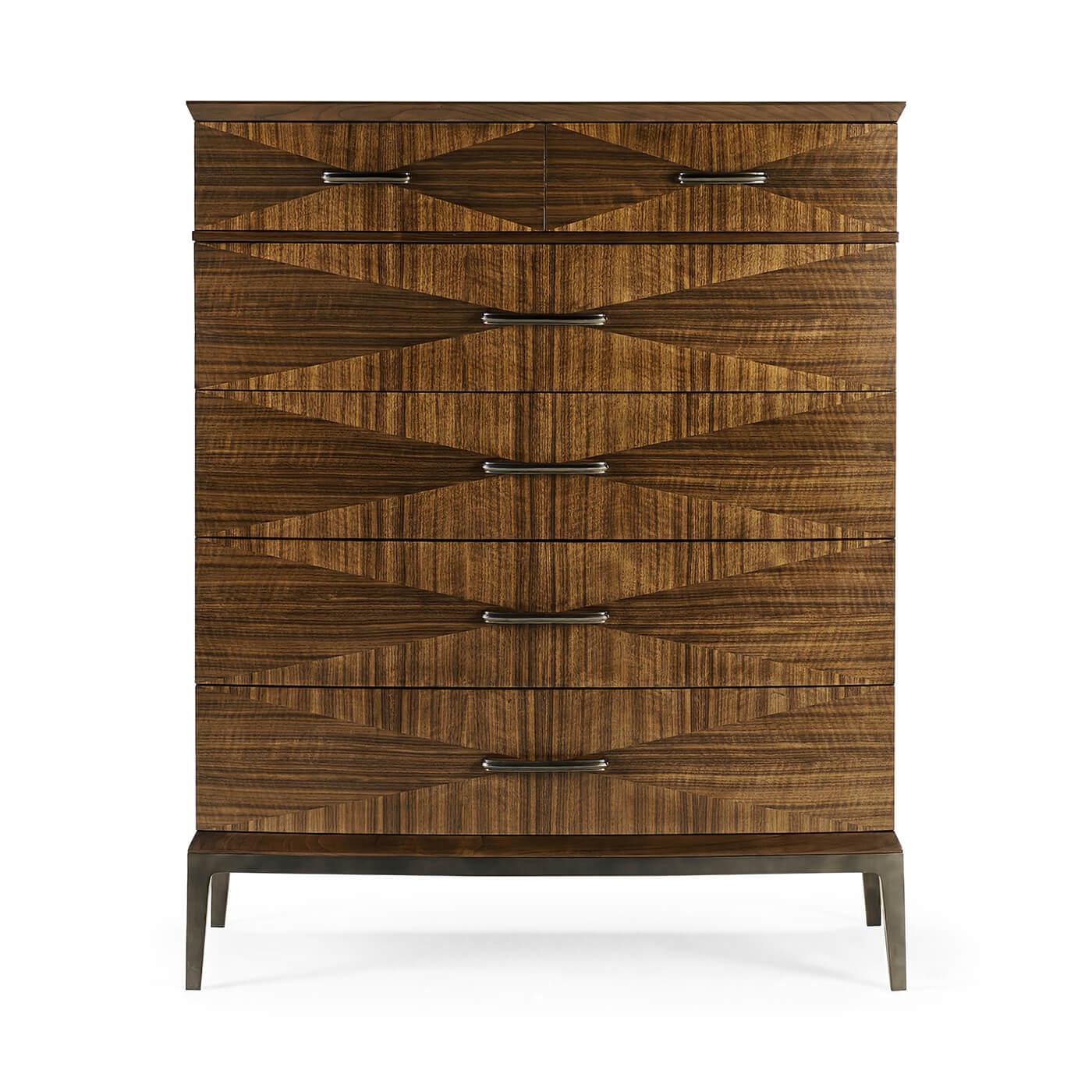 A Mid-Century Modern style tall chest of drawers, constructed of American walnut with a transparent, lacquer finish. The six graduated drawer fronts feature walnut veneers in a box match pattern. Hardware is cast from brass, acid dipped and