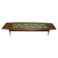 Retro Mid century modern walnut tapered coffee table with colorful ceramic tiles lower