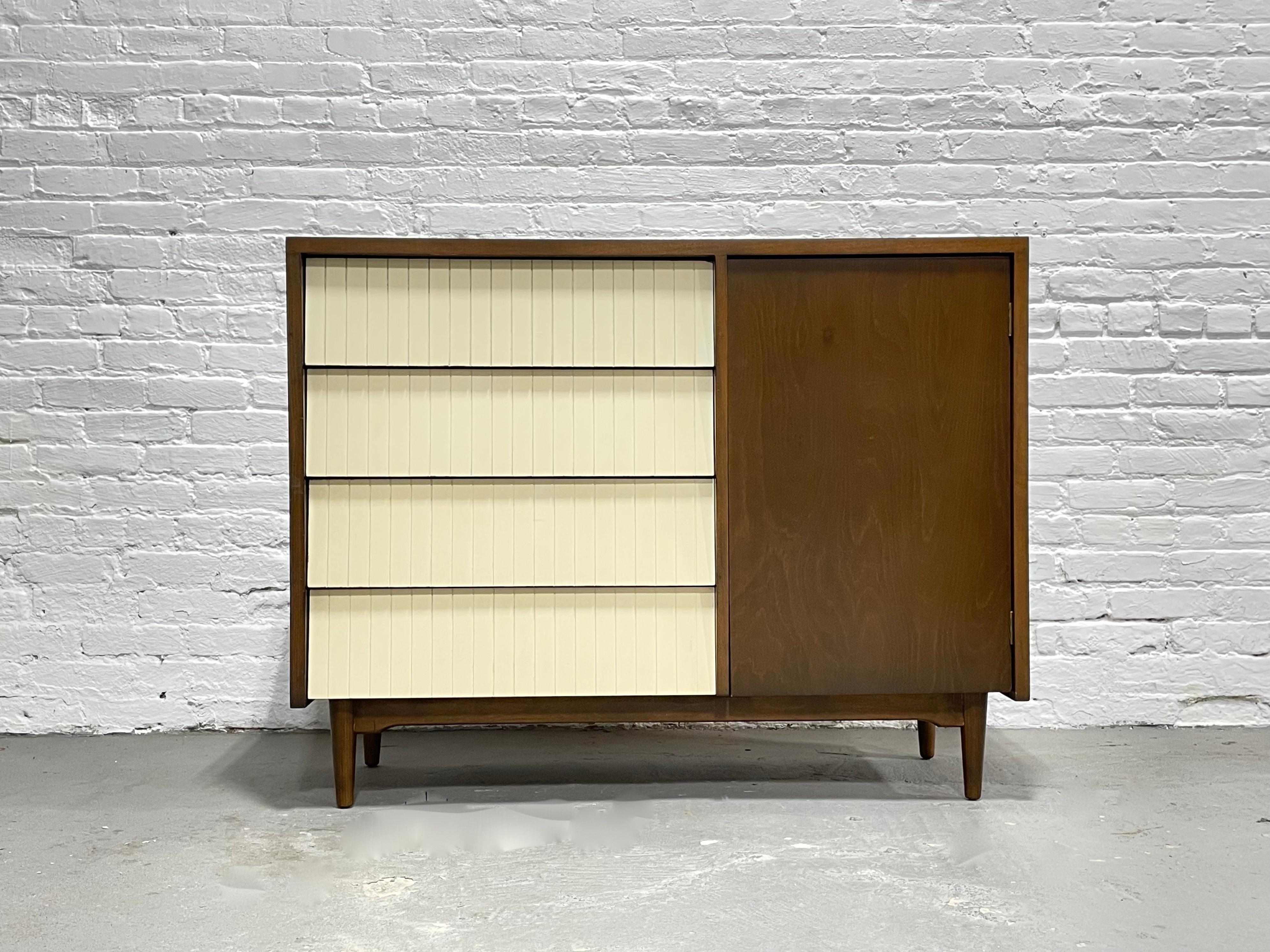 Mid Century Modern Walnut + White Gentlemen's Chest / dresser by Lawrence Peabody for Child Craft, c. 1960's. This lovely piece offers all the clothing storage you will need in one streamlined piece.  One side offers 4 deep and spacious white