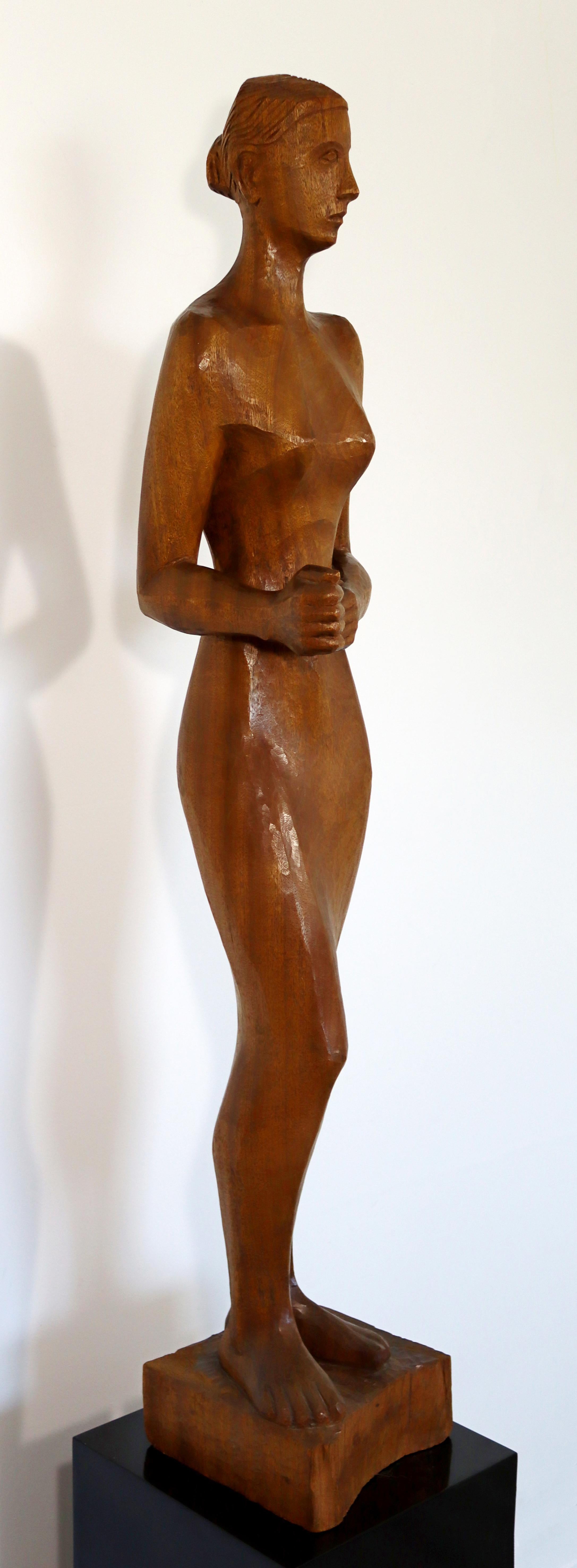 For your consideration is a gorgeous, wood carved sculpture or staute of a thin woman, signed and dated by Walter Midener, 1960. In excellent vintage condition. The dimensions of the sculpture are 9