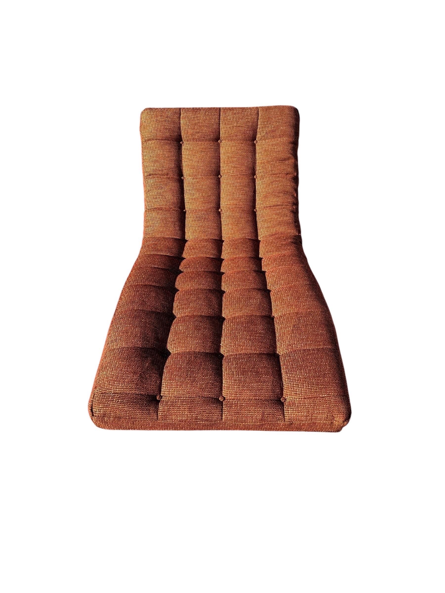 This mid-century modern wave rocking chaise lounge is a striking example of sculptural furniture design from the period. Featuring bold curves, tufted upholstery, and a distinctive rocking base, the piece embodies the dramatic lines and organic form