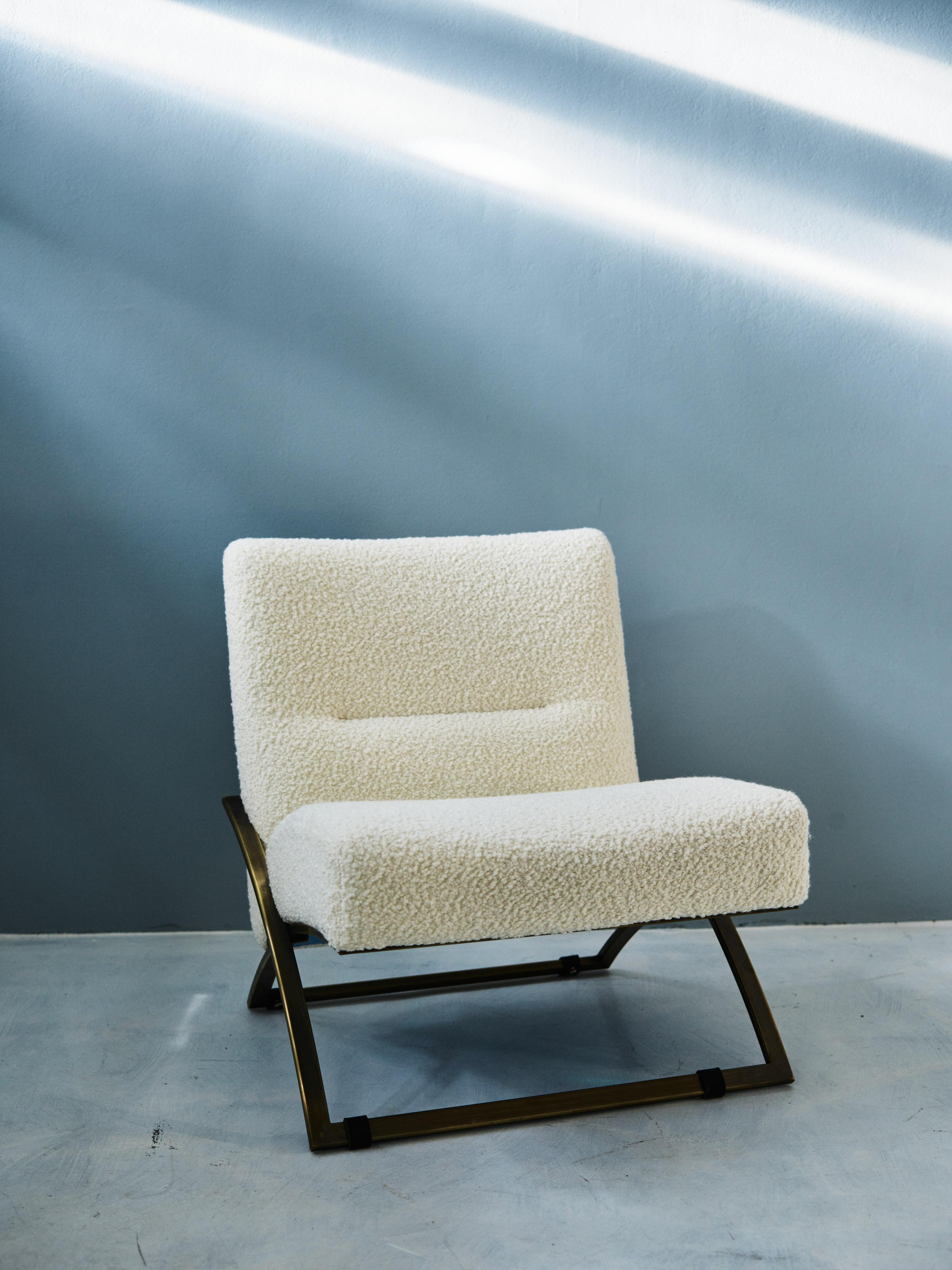 The mid-century modern Wave S11 armchair was designed by Peter Ghyczy in 2016 and hand-crafted in the GHYCZY atelier in the South of the Netherlands. The Wave S11 armchair features an ergonomic and dynamic frame composed of aged brass tubing and a