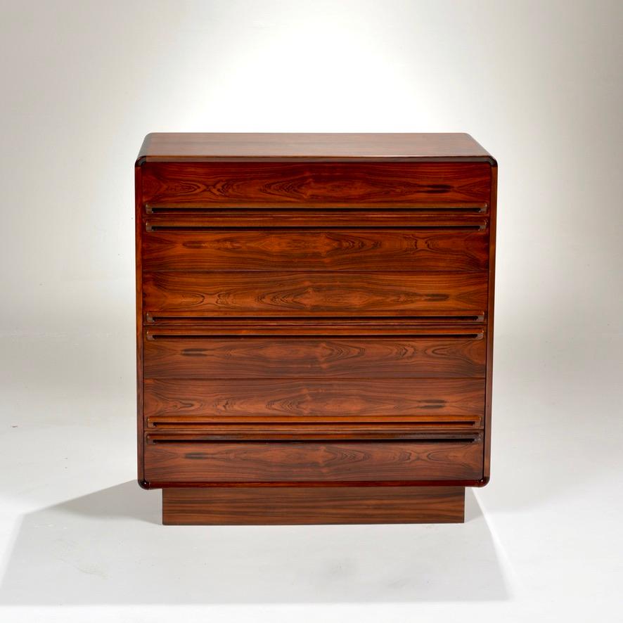 Elegant dresser designed and manufactured by Westnofa Furniture in Norway circa 1960s, recently refinished and in excellent condition. Featuring a Brazilian rosewood frame with six dovetailed drawers. Each drawer is accented with Westnofa’s