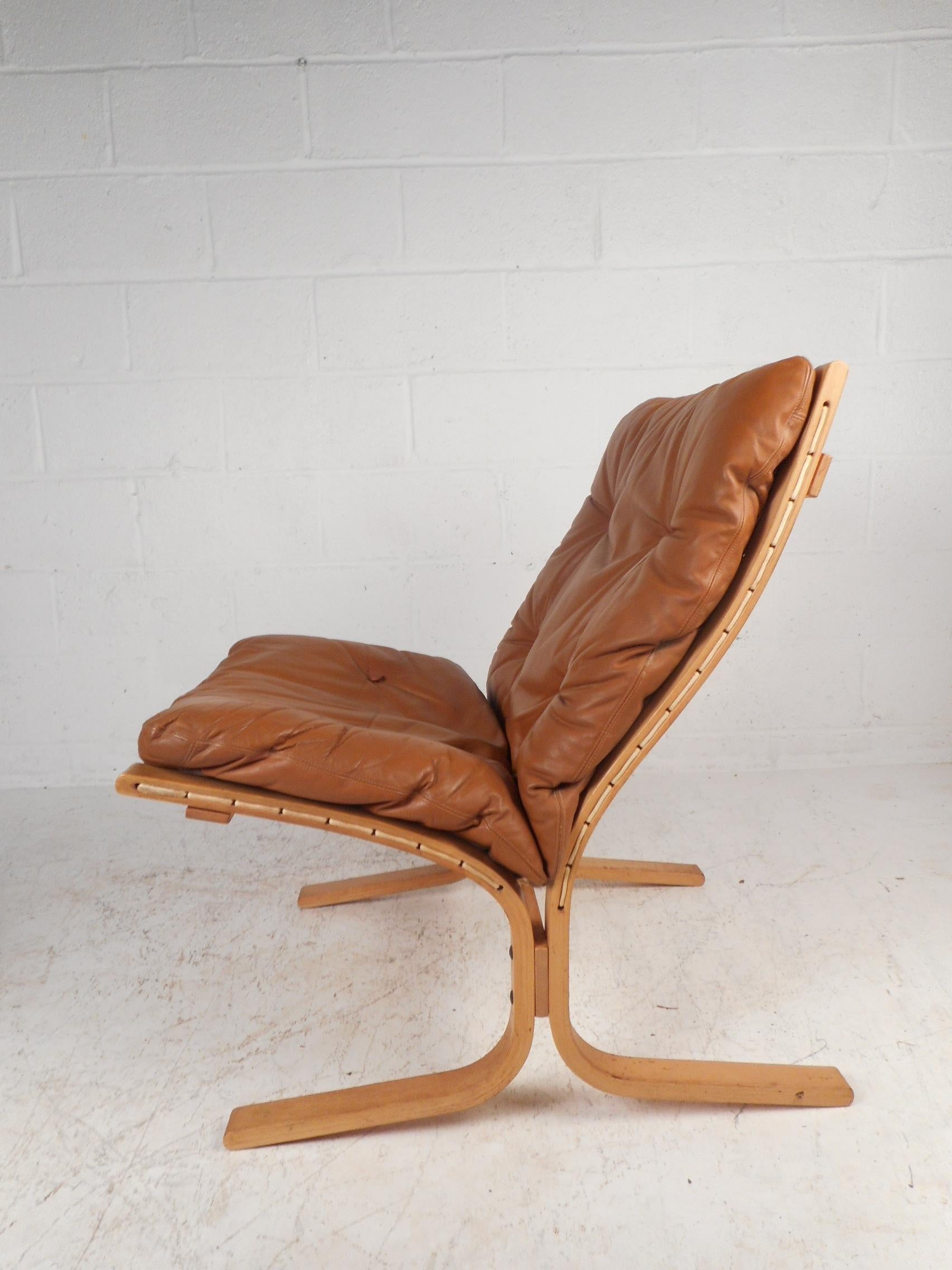 Danish Mid-Century Modern Westnofa Lounge Chair and Ottoman