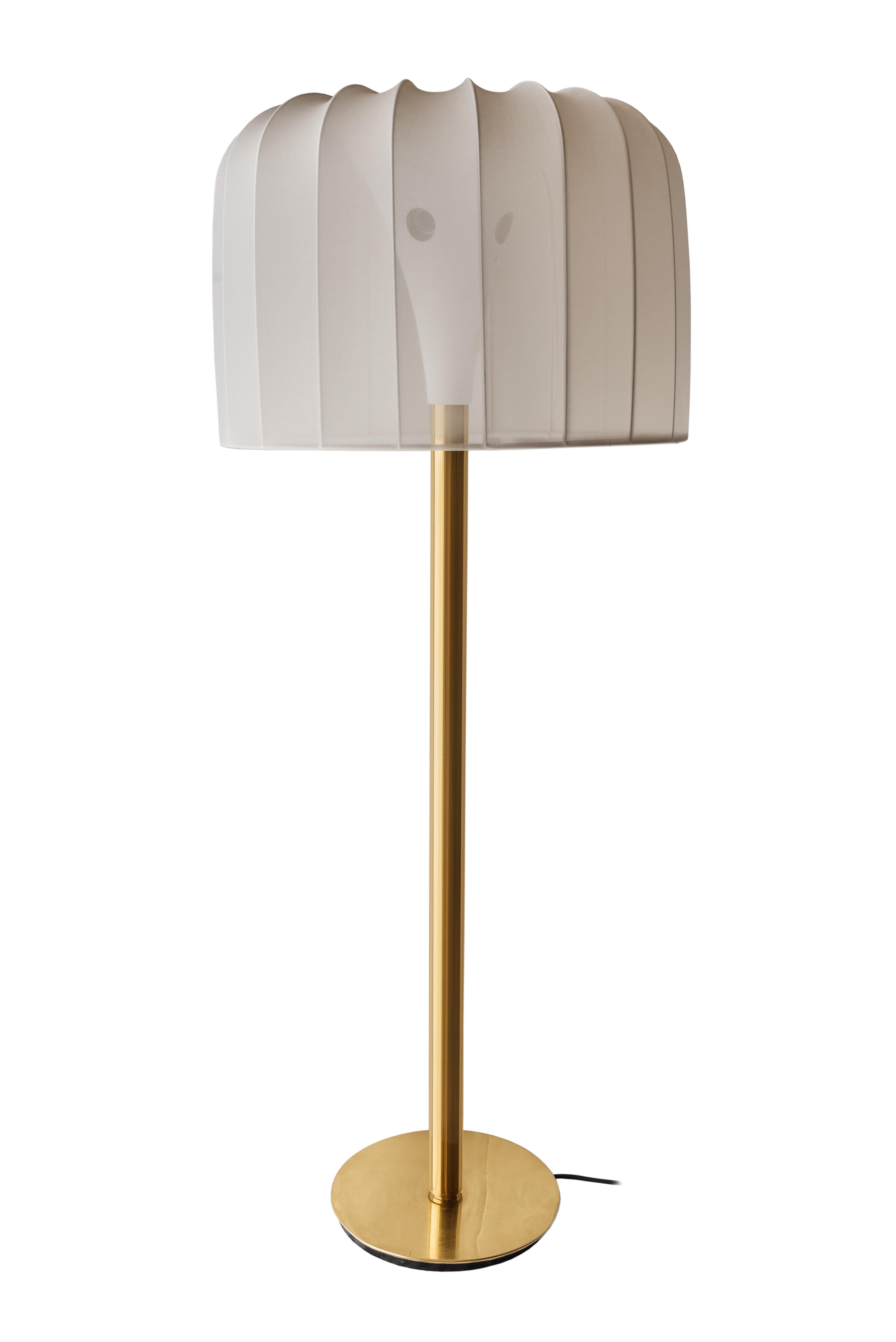 Mid-Century Modern white and brass uplighter by Staff Leuchten, Germany, 1960s.
A rare large floor lamp with a brass stem with cream ruched-fabric shade. Rewired. Few scuffs mark to the brass surface. Some pitting to top metal. Fabric is new.
Cast