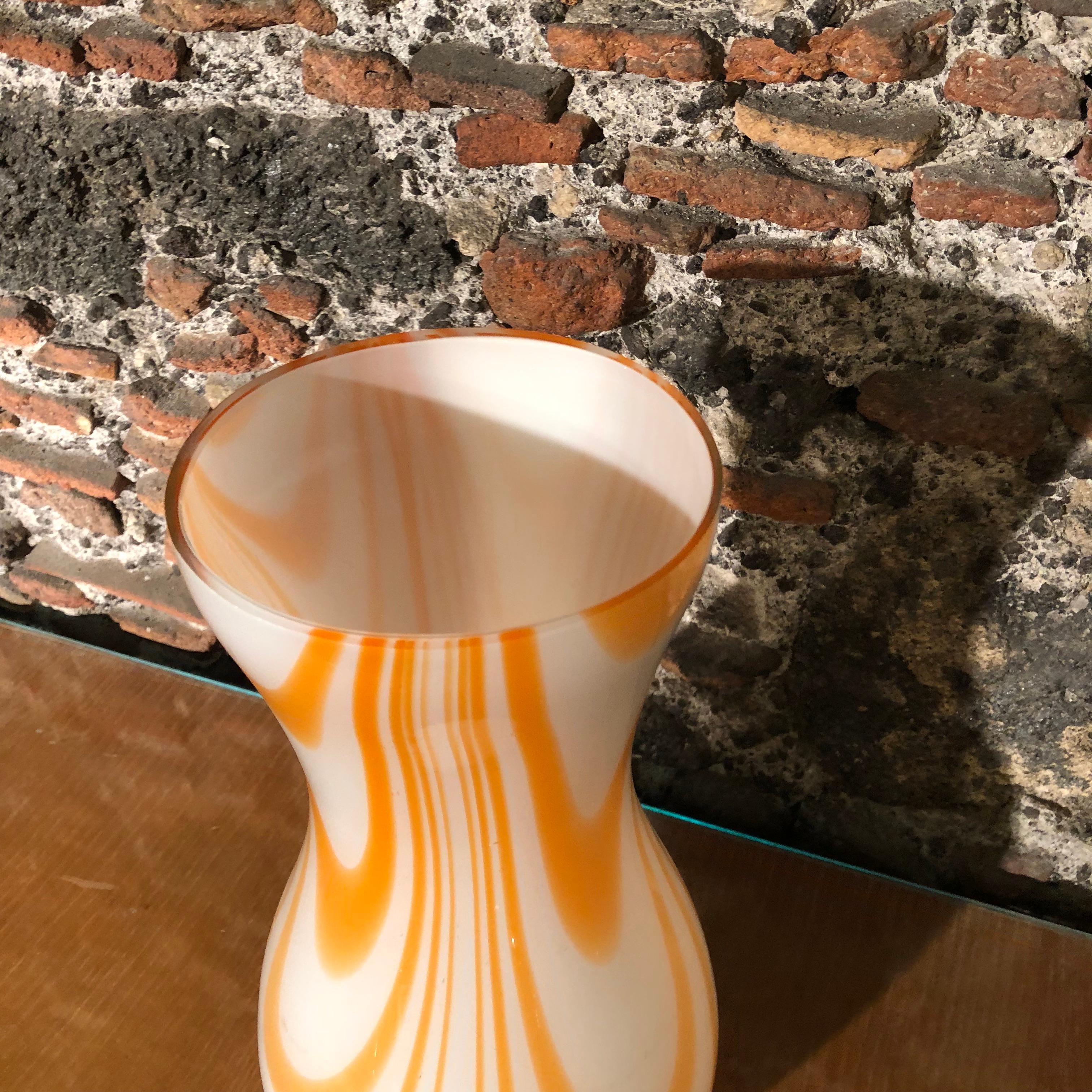 A particular Murano opaline vase, made in Italy in the Seventies, labeled 