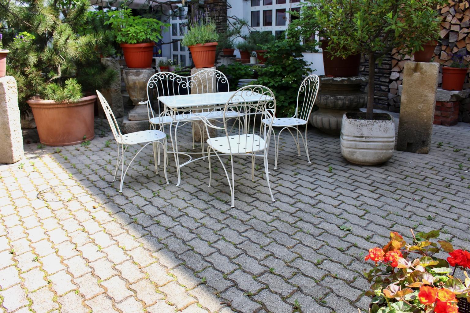 white metal outdoor chairs