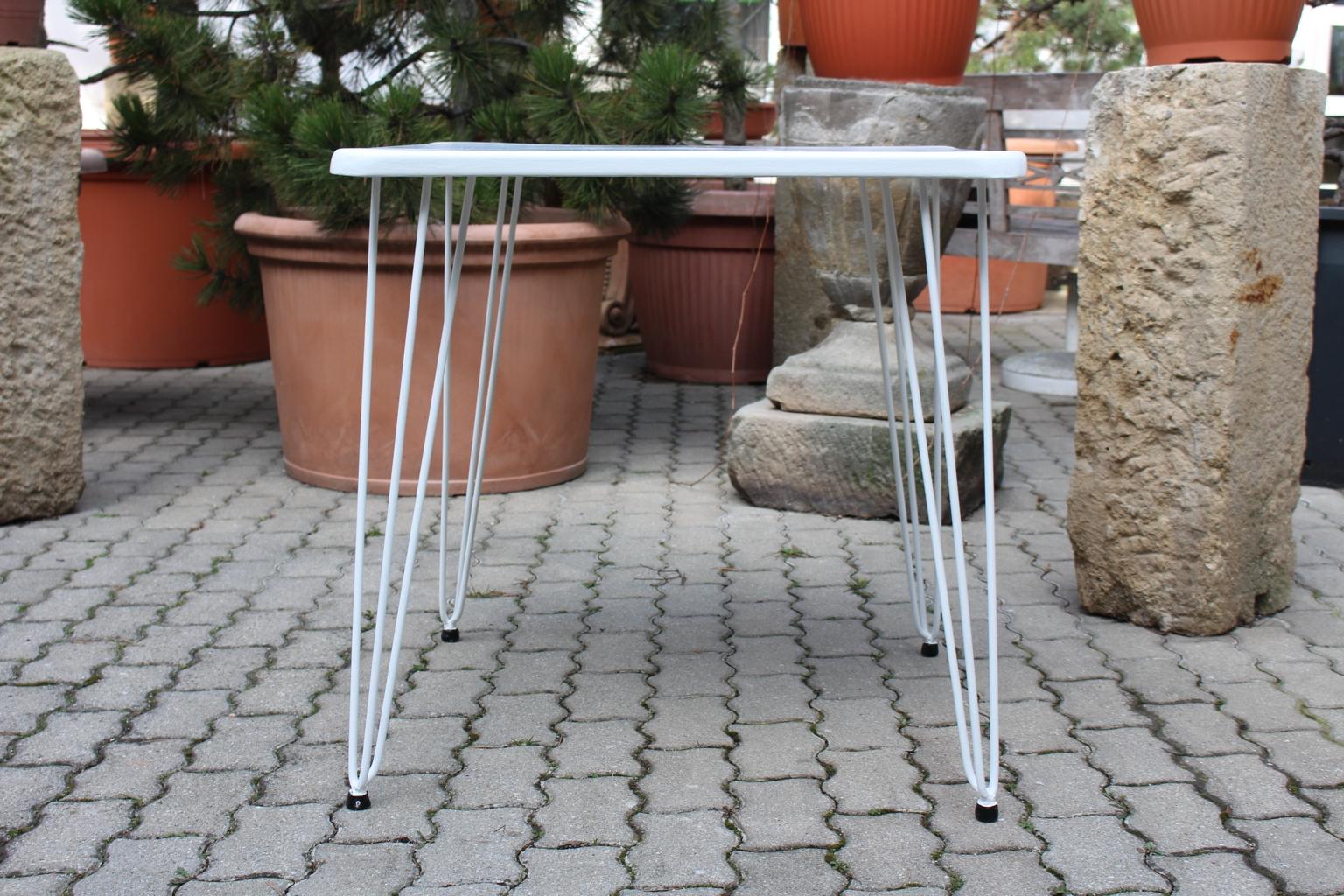 white metal garden table