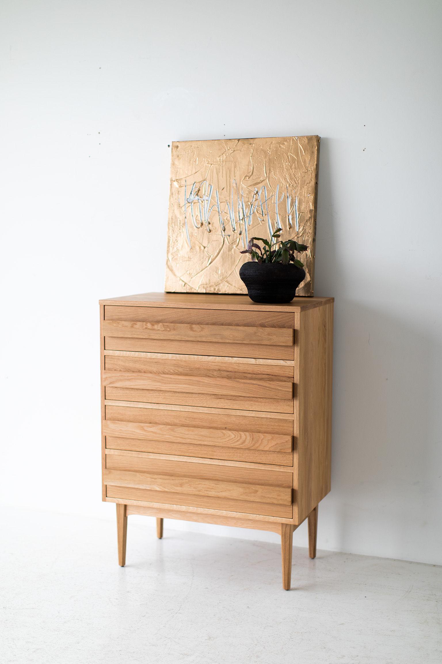 This Mid-Century Modern white oak dresser is made in the heart of Ohio with locally sourced wood. Each dresser is hand-made with solid white oak and finished with a beautiful matte commercial grade finish. It is important to us to let the natural