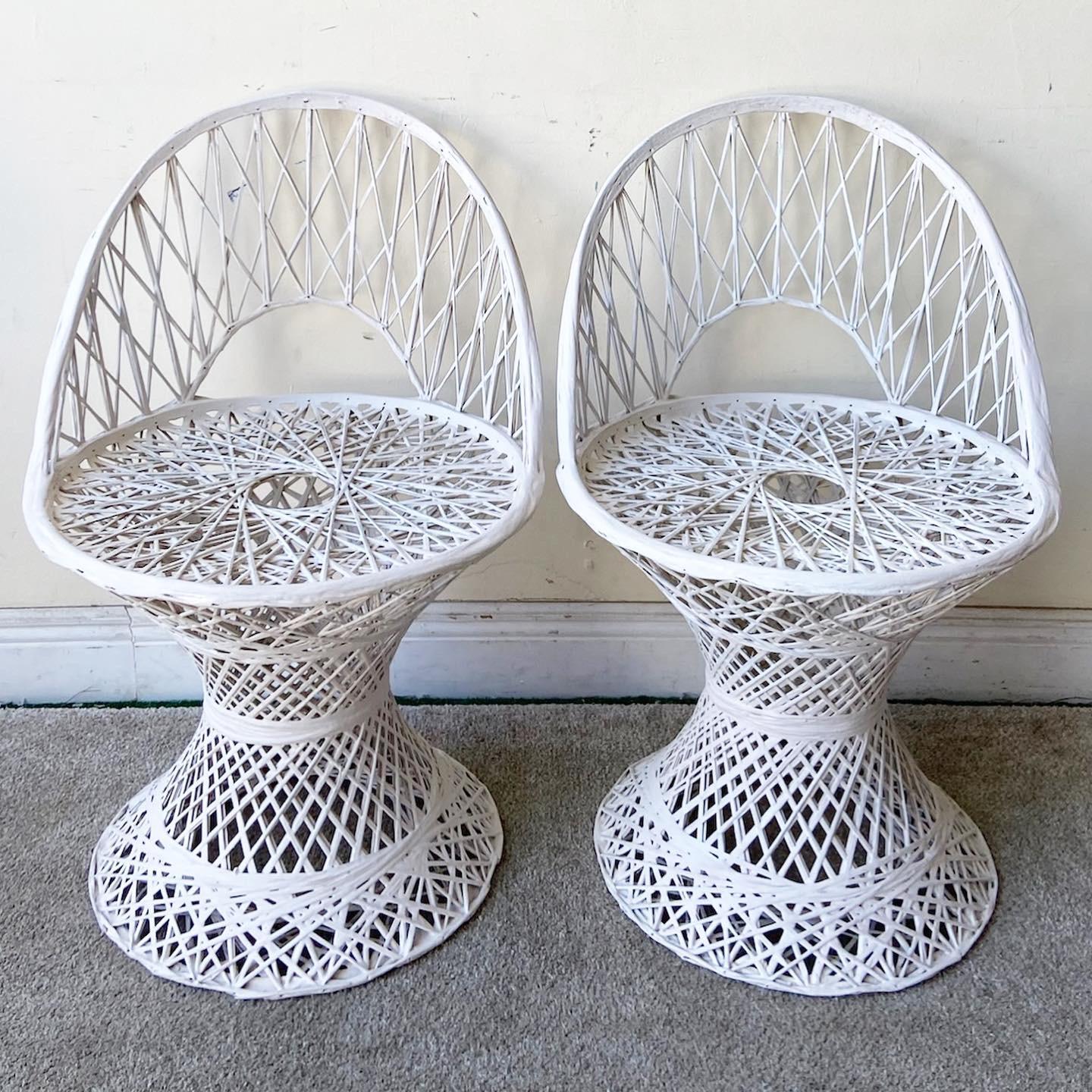 Exceptional set of 4 Mid-Century Modern spun fiberglass chairs. Each feature an arched backrest and fabulous woven design.
   