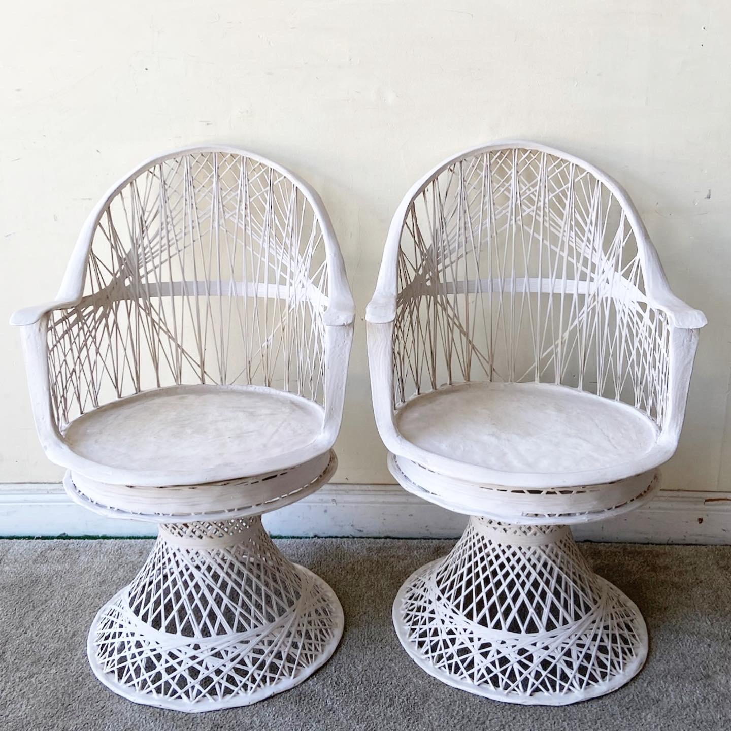 Exceptional mid Century Modern Russell Woodard spun fiberglass swivel dining chairs.
