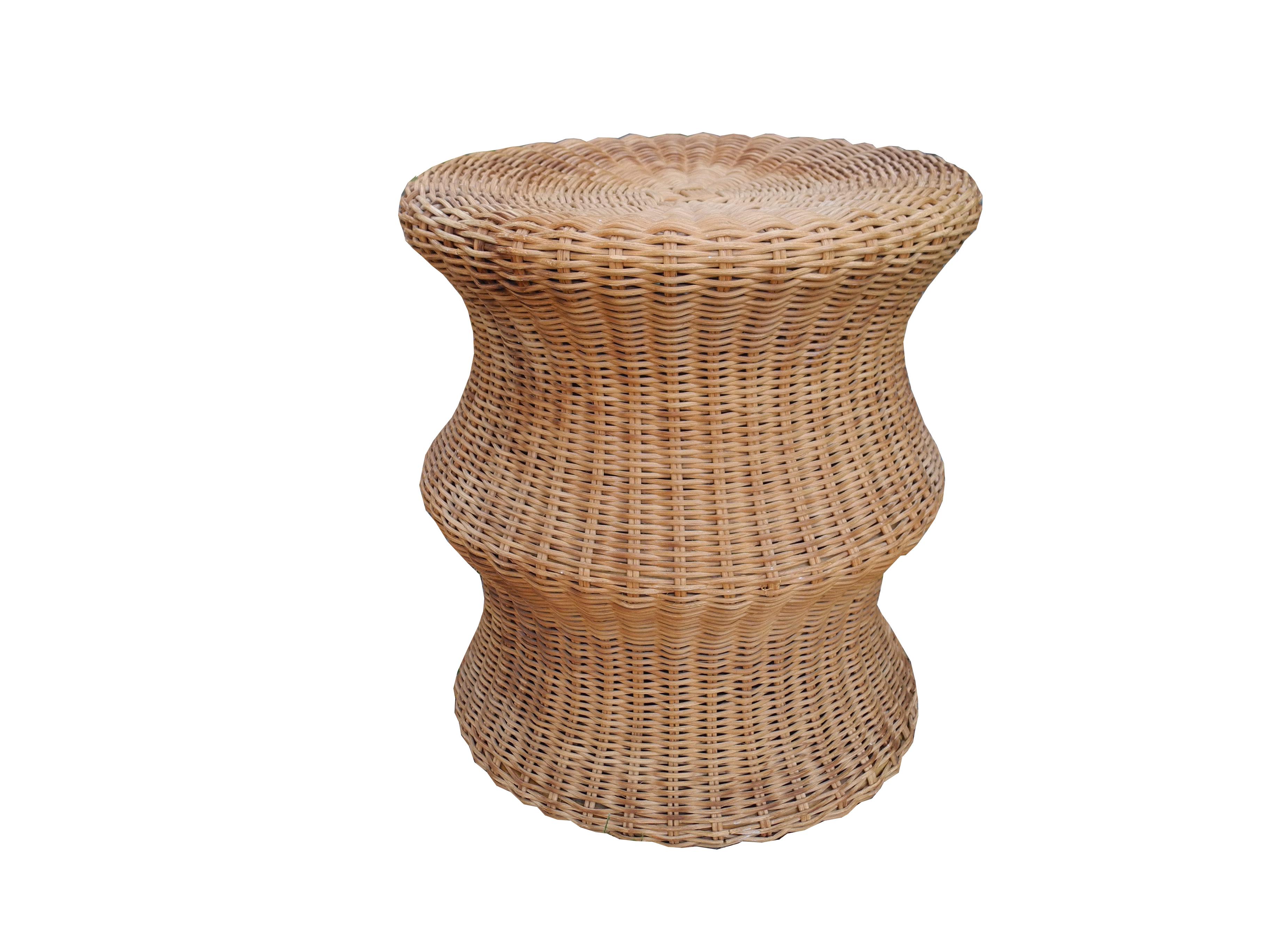 Midcentury stool made of sturdy wicker and beautifully shaped is made by the Finnish designer Eero Aarnio. The stool is stamped Stendig on the inside.