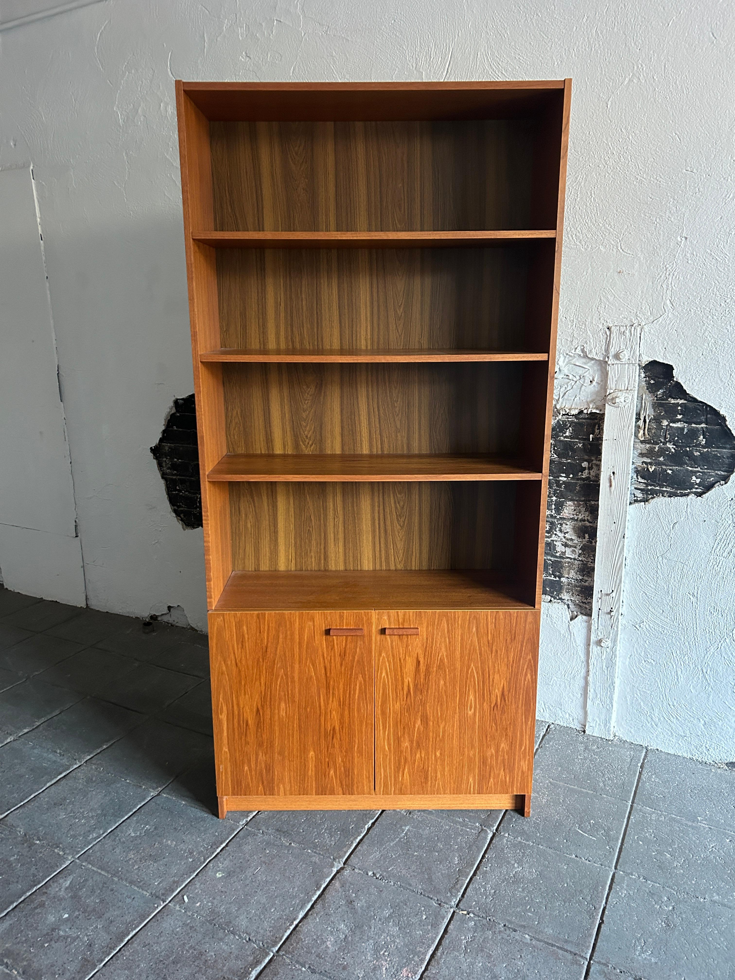 Teak Mid-Century Modern wide teak tall bookcase (2) cabinet doors Made in Denmark  For Sale