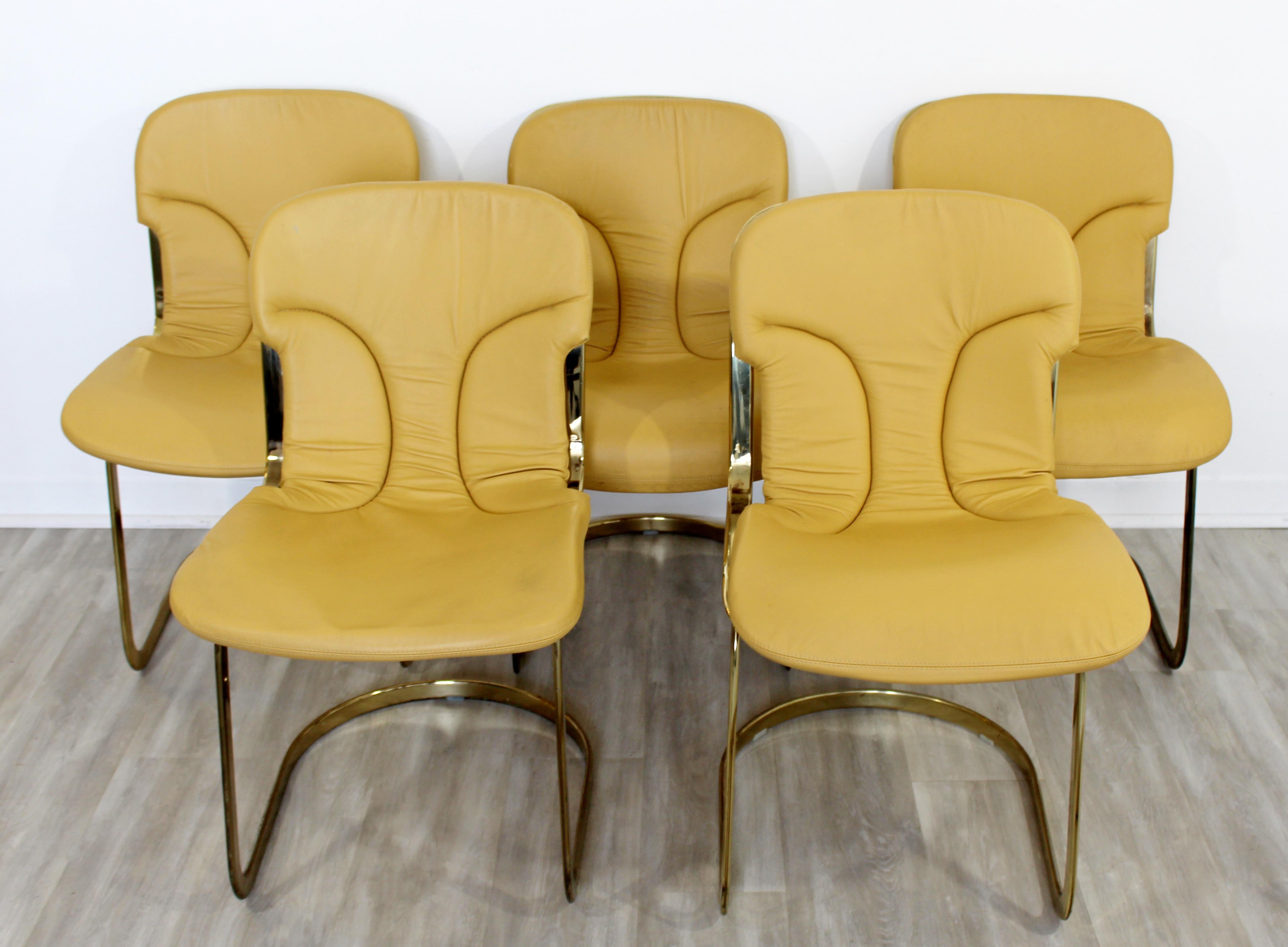 For your consideration is an utterly fabulous set of five, cantilevered brass side dining chairs, by Willy Rizzo for Cidue, made in Italy, circa 1970s. In good vintage condition, with a patina to match its age. The dimensions are 18.5